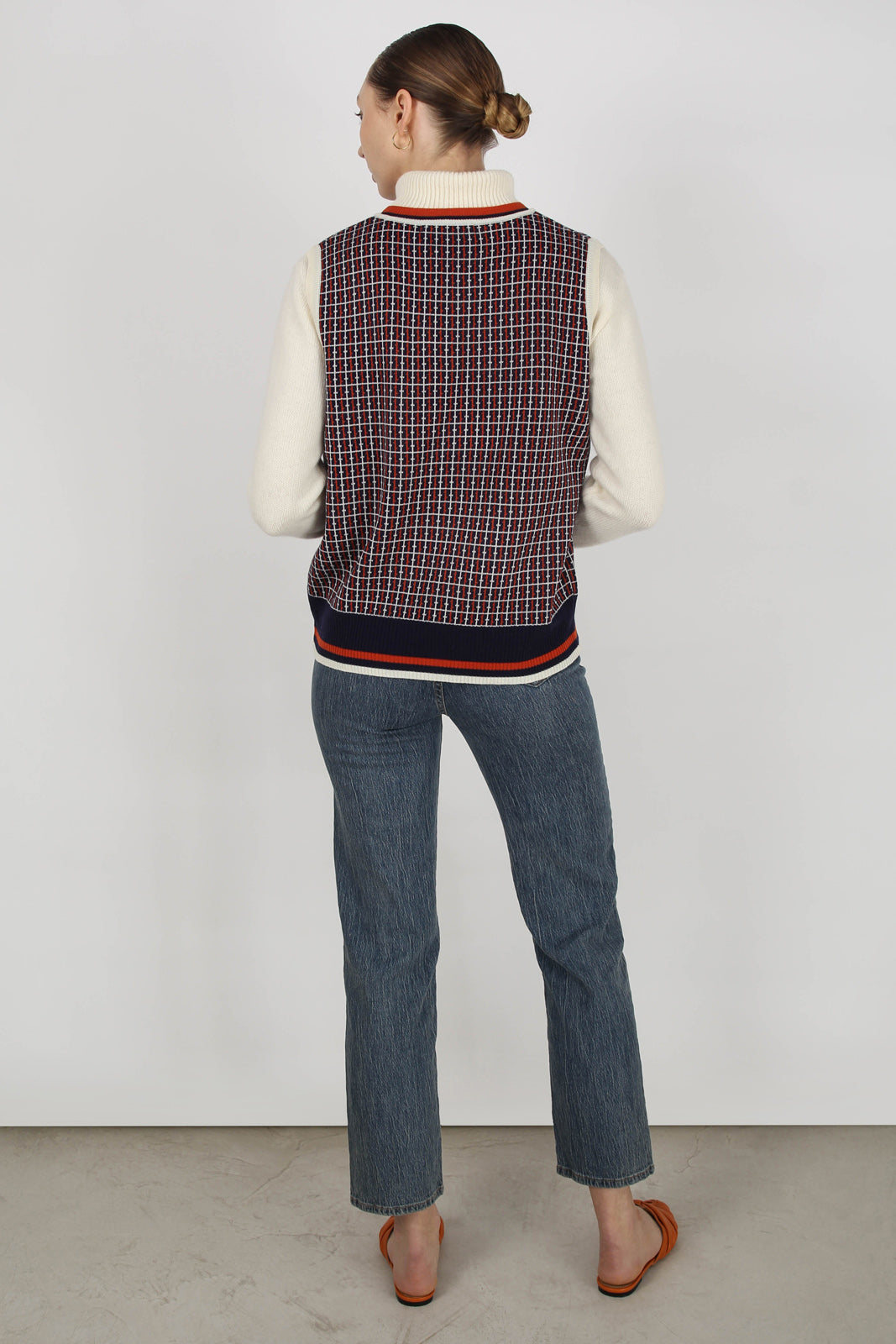 Navy and orange graphic V neck sweater vest_3