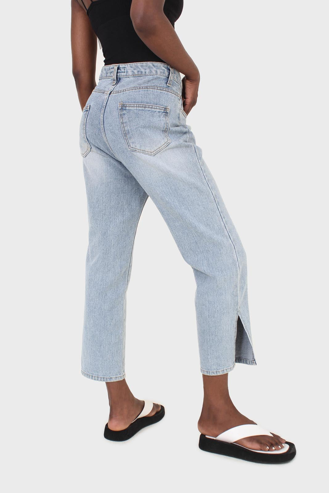 Light blue wash exposed button jeans_6