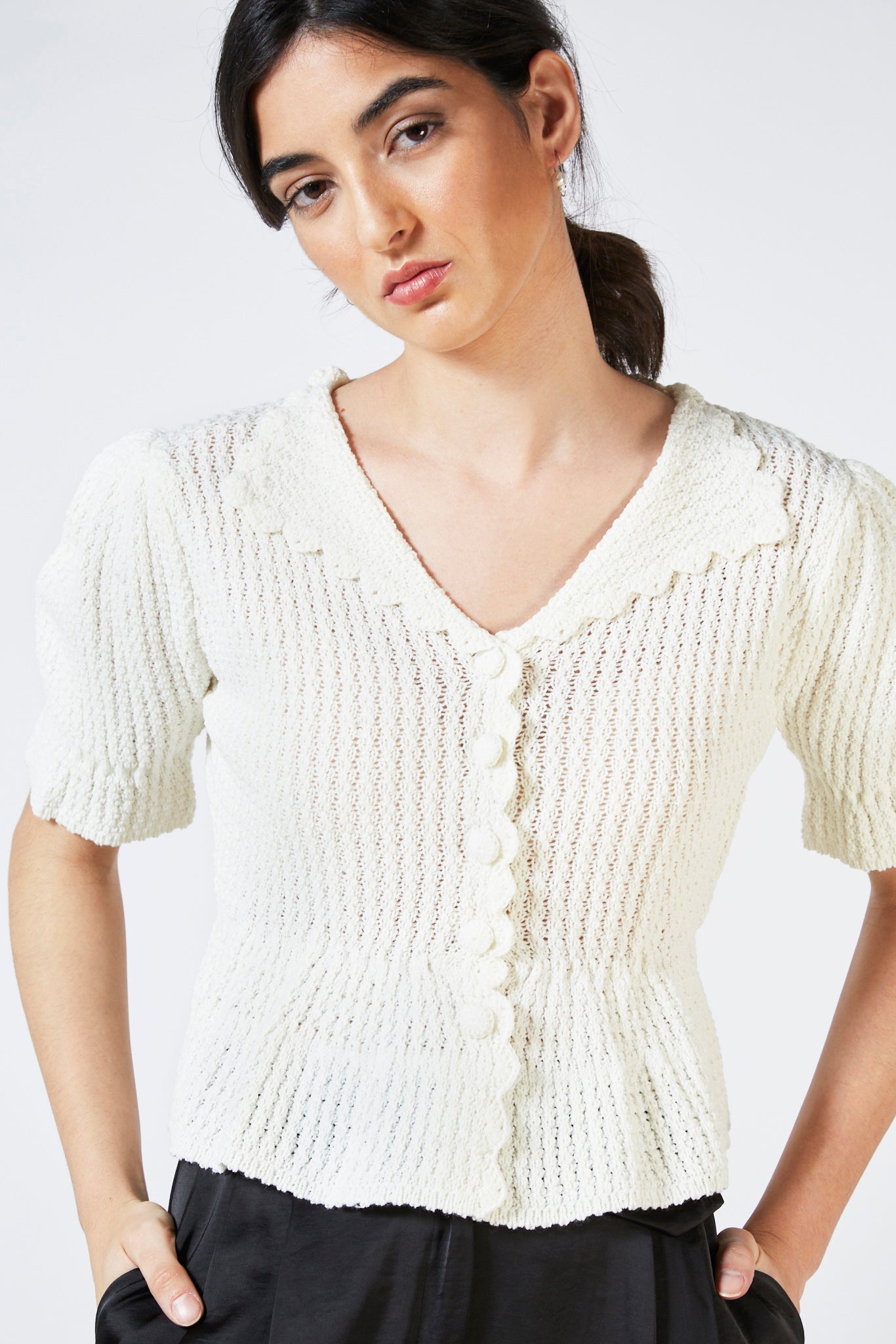 Ivory peplum short sleeved cardigan_1