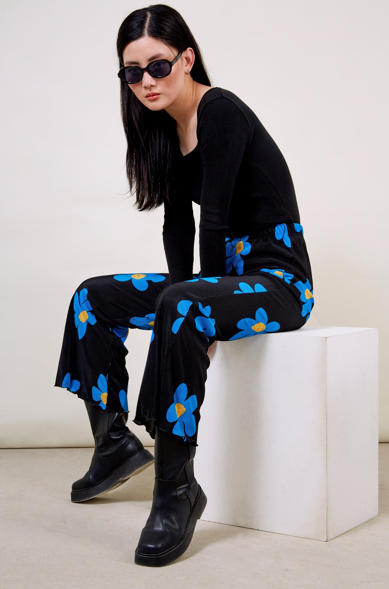 Bright blue daisy print trousers_1