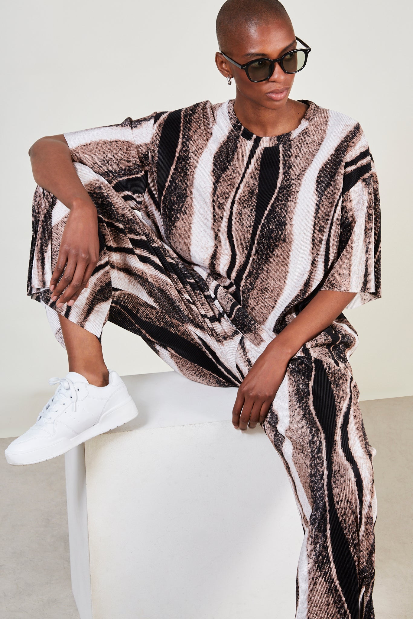 Beige and black abstract print short sleeved top_1