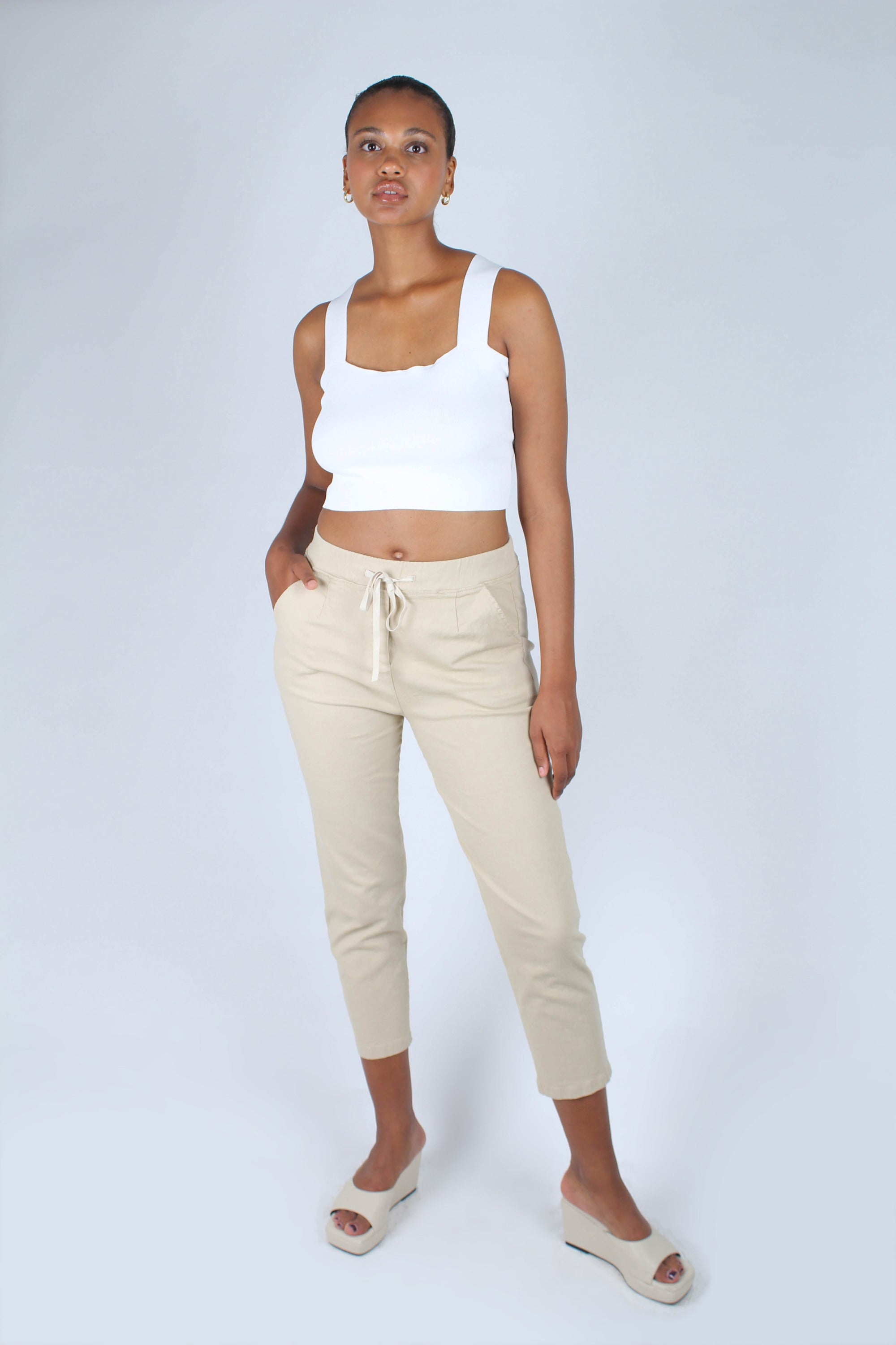 Beige dart front loose fit drawstring trousers_1