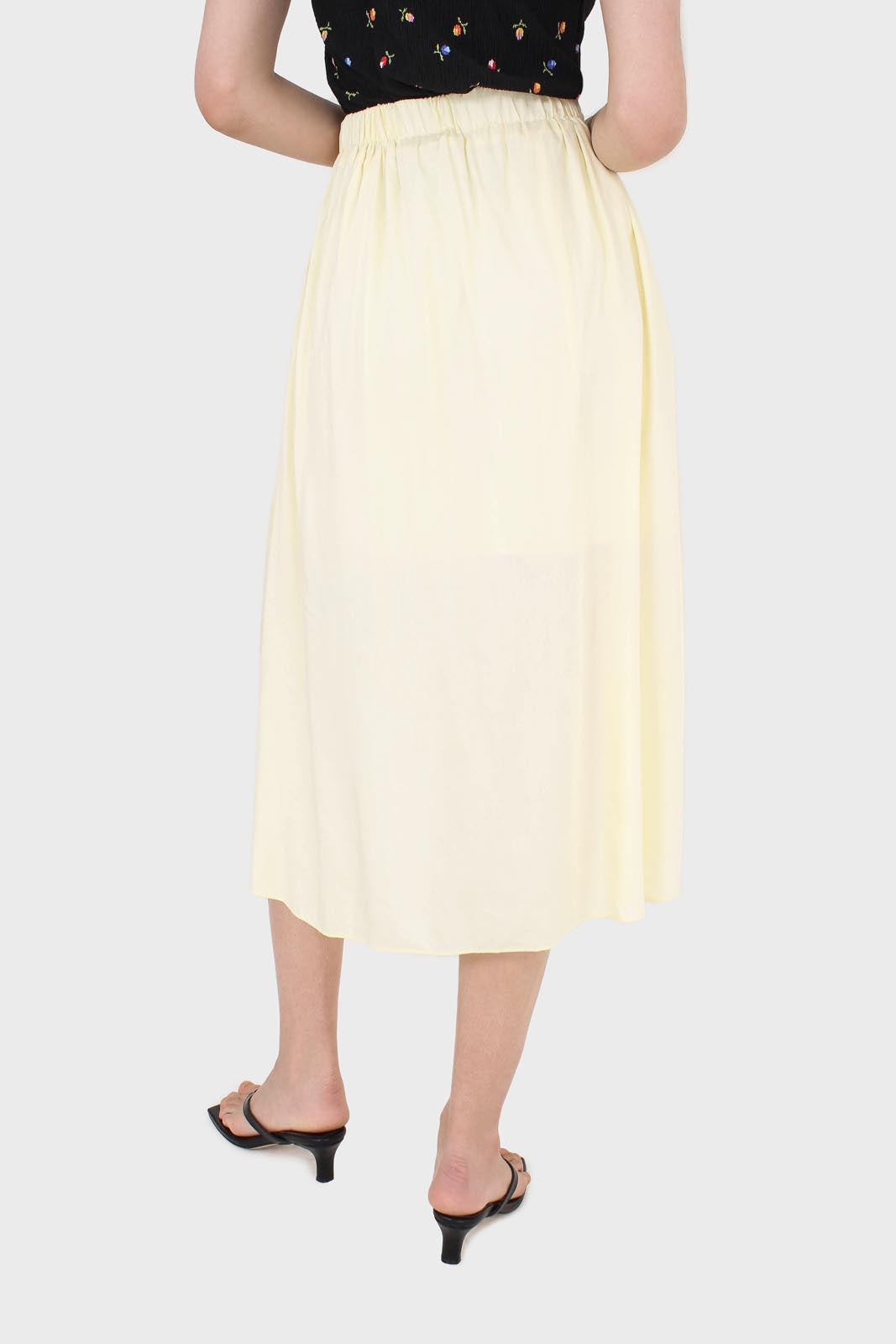 Pale yellow asymmetric hem midi skirt_2