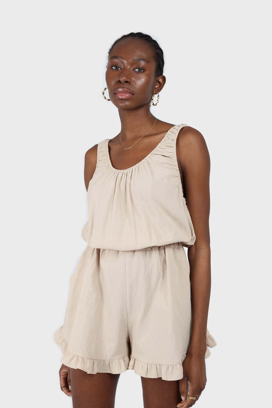 Beige ruffle hem sleeveless romper_1