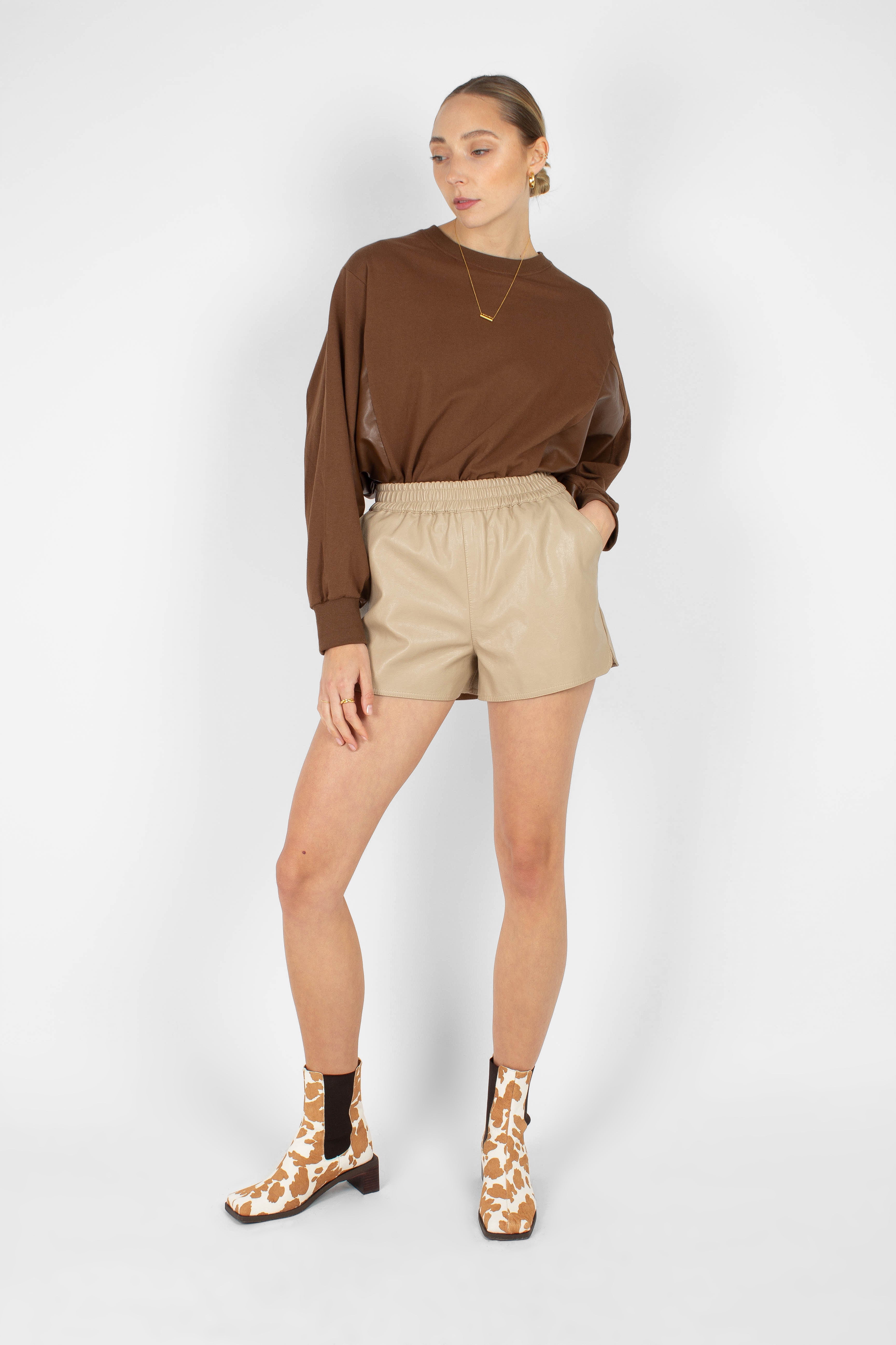 Beige vegan leather running shorts_2