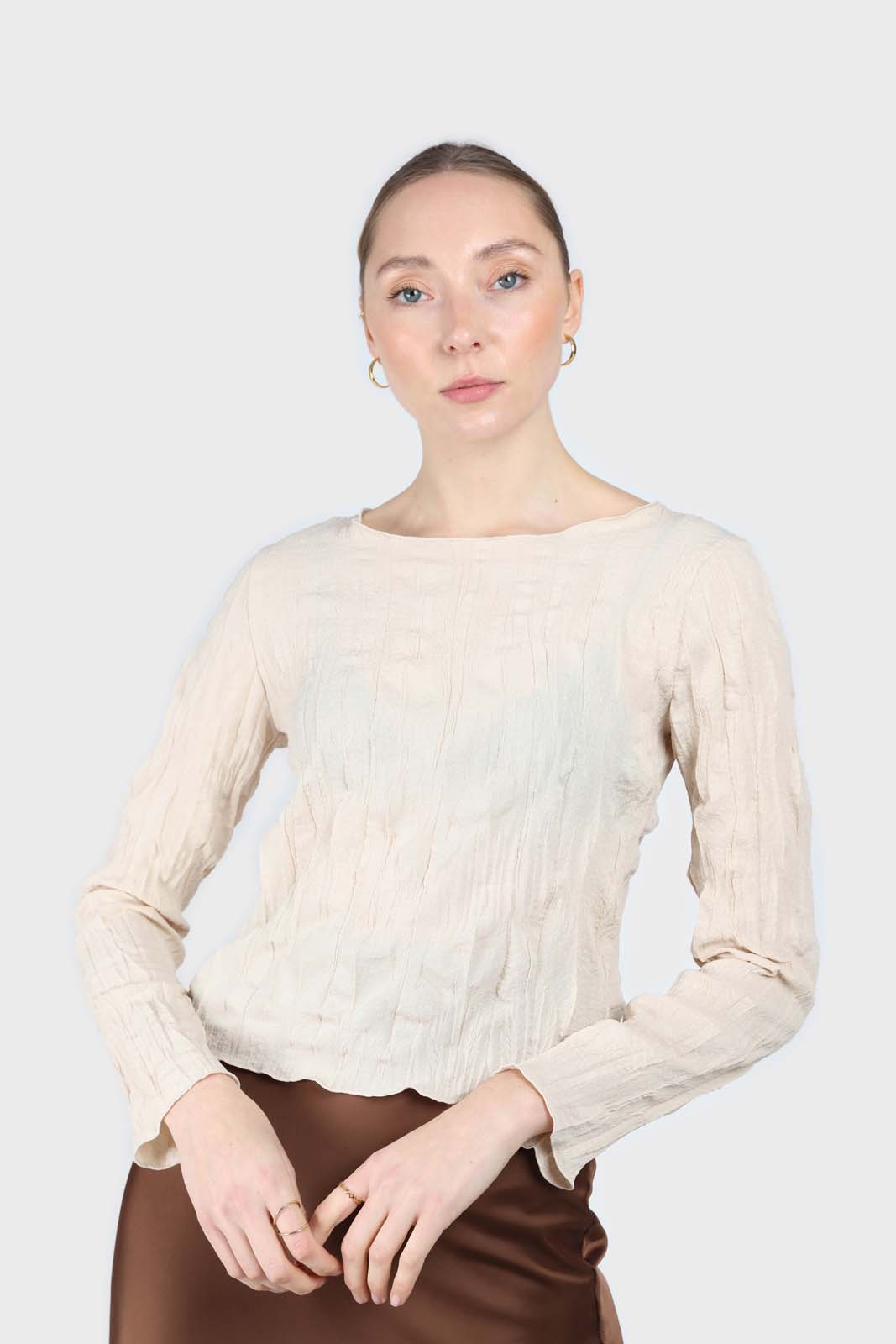 Beige wrinkled long sleeved top_1