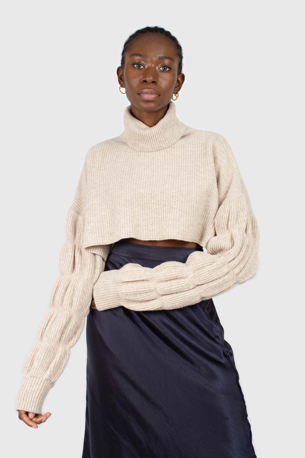 Beige balloon sleeved cropped wool blend turtleneck top_1
