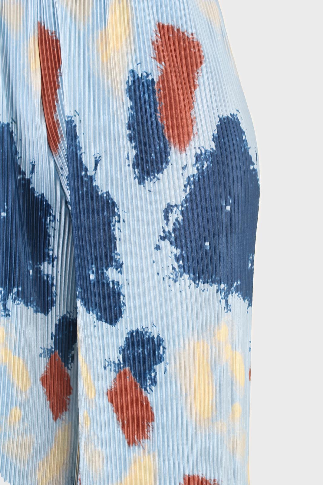 Blue and brown dye splotch micro pleat loose fit trousers_6