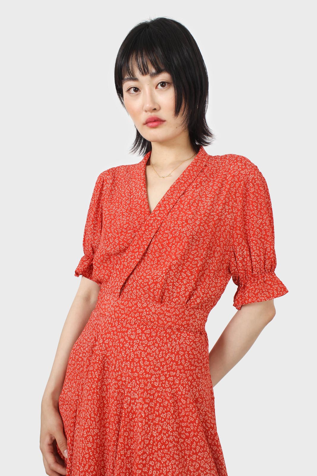 Orange and ivory floral puffed sleeve wrap mini dress_10