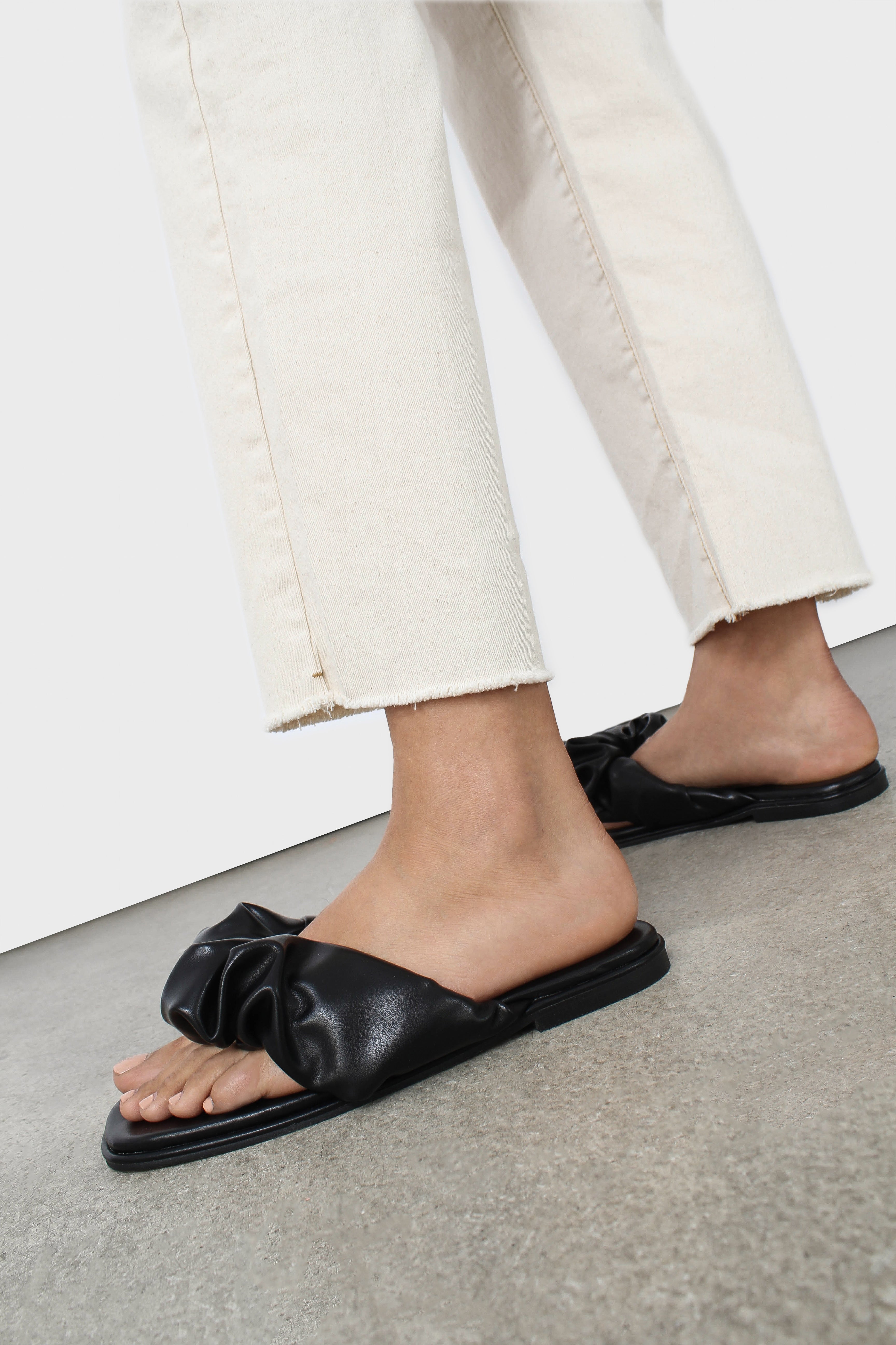 Black puffed vegan leather sliders_13