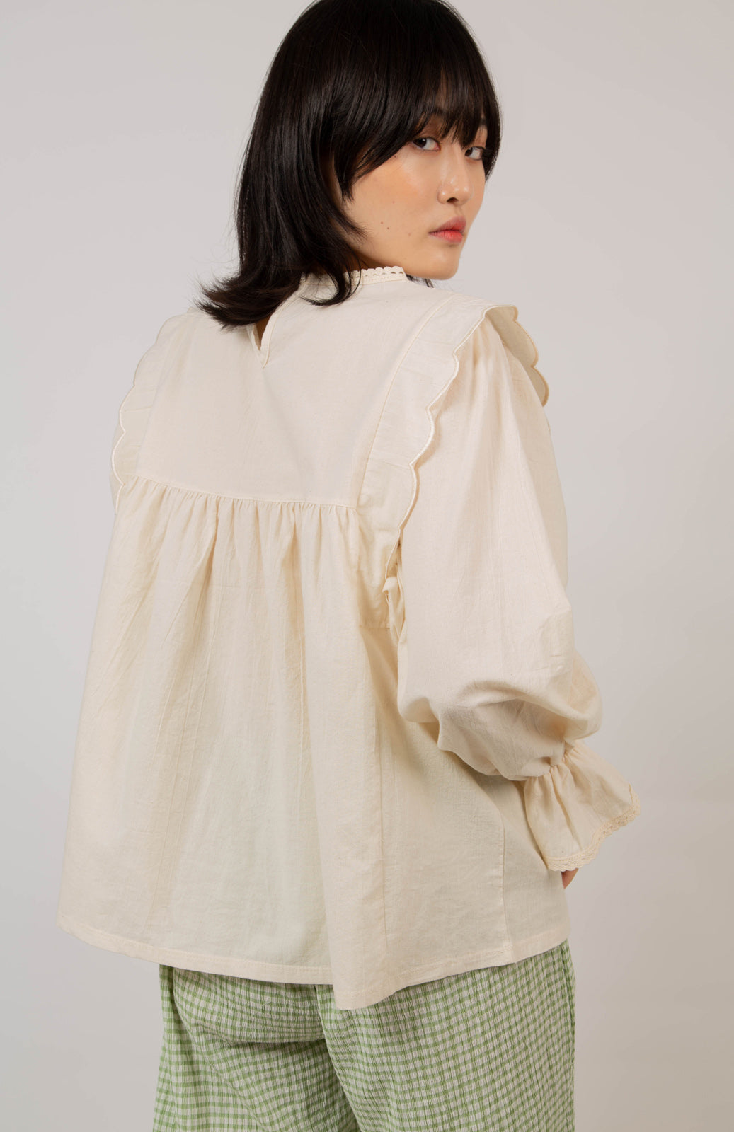 Beige ruffle trim seamed yoke blouse_8