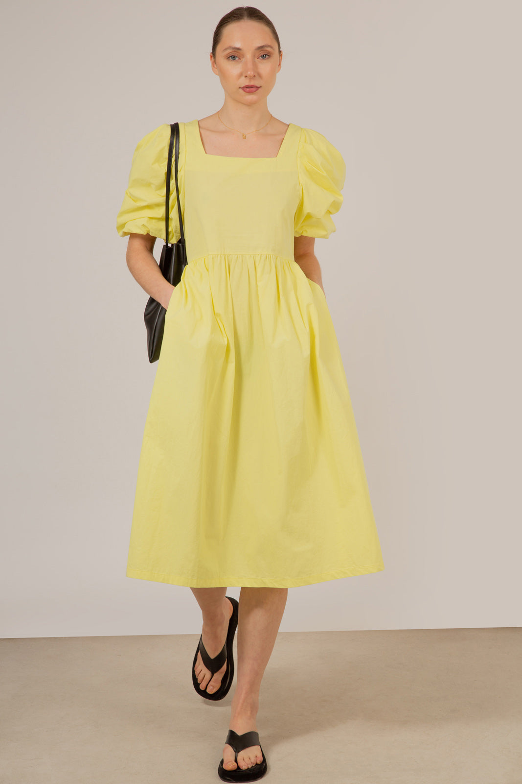 Yellow puff sleeve button back midi dress_1