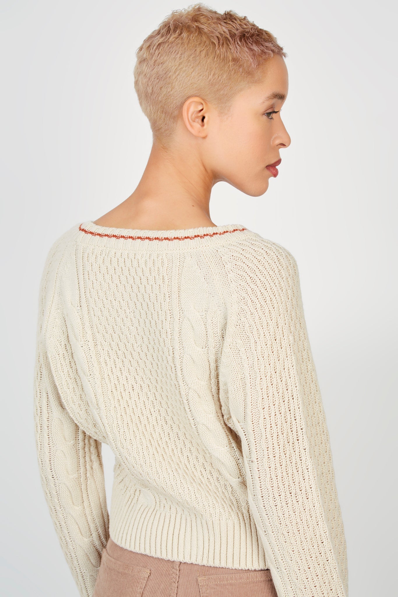 Beige cableknit red trim cardigan_2