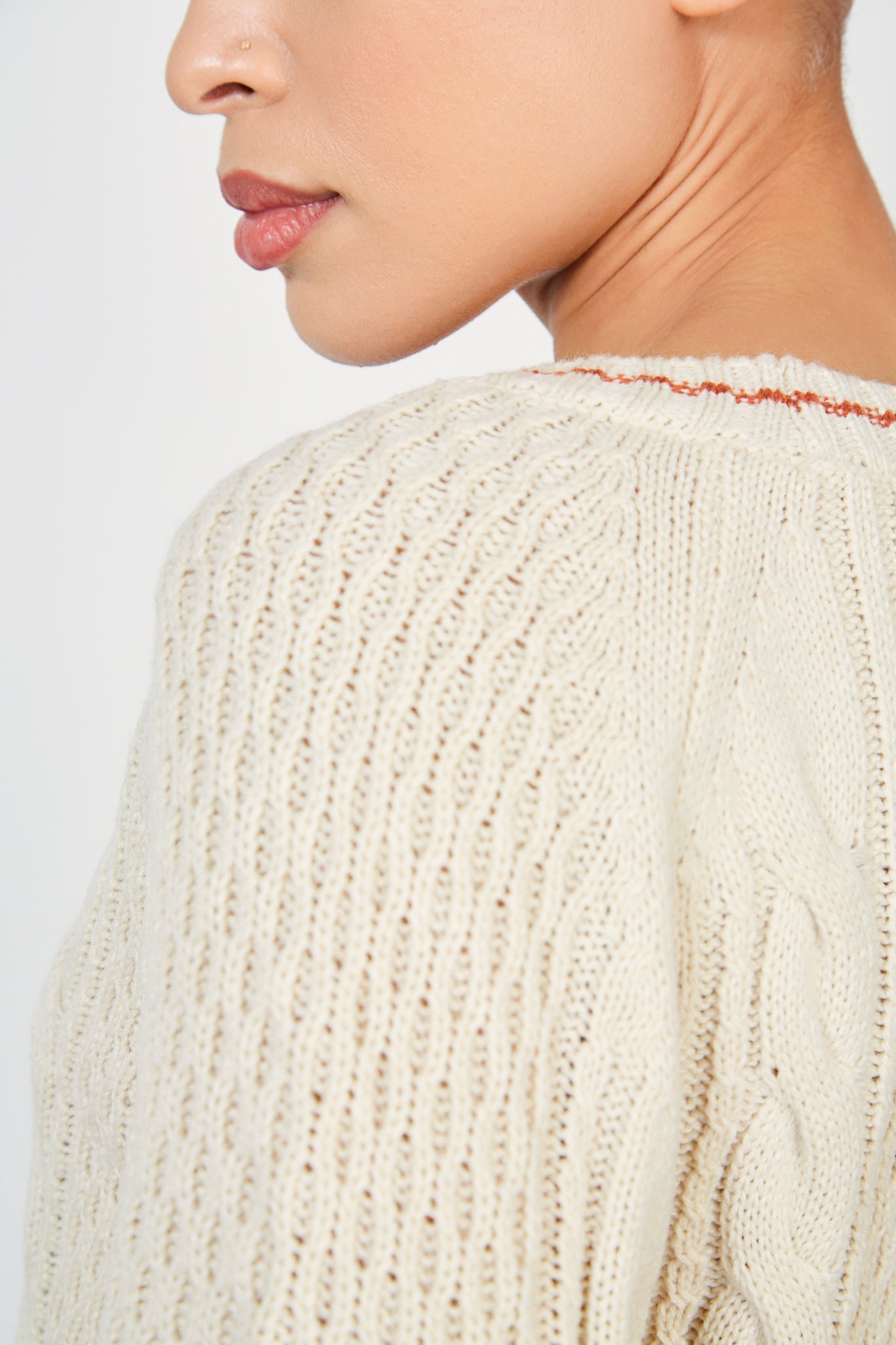 Beige cableknit red trim cardigan_4