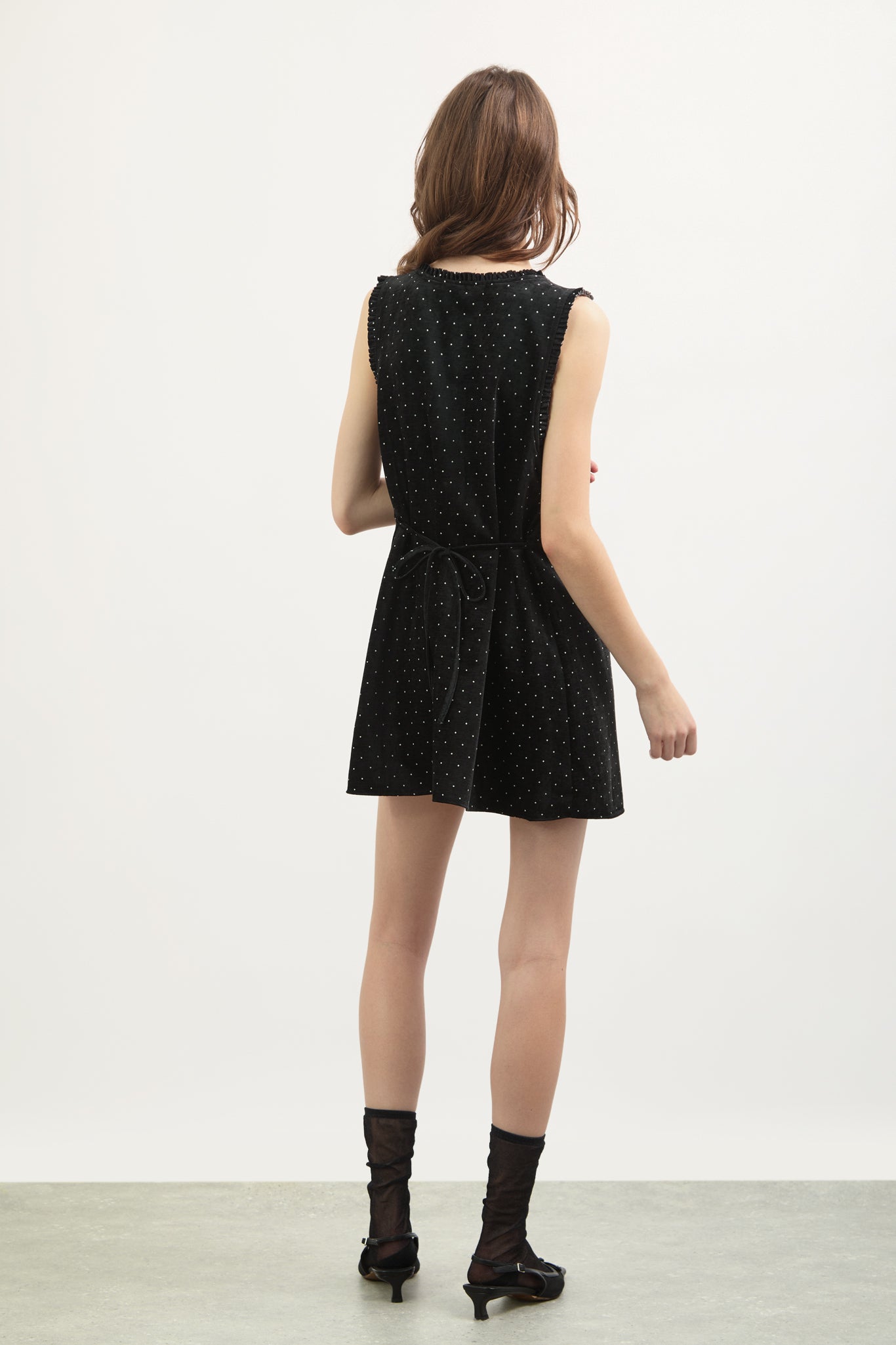 Black and ivory polka dot ruffle trim tie back mini dress_2