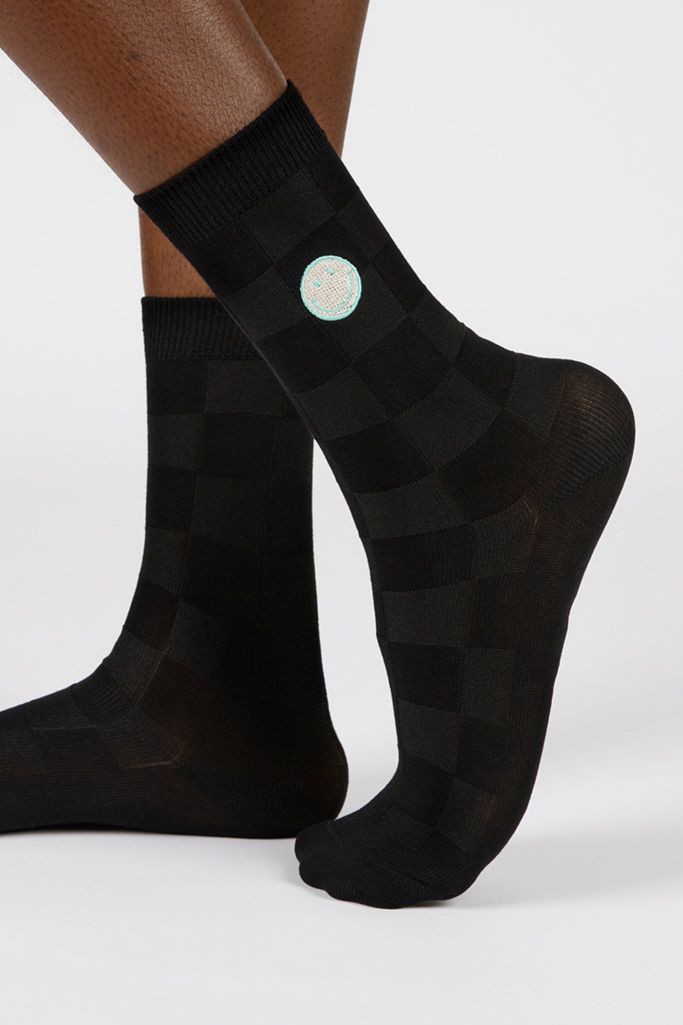 Black intarsia block embroidered smiley face socks_1