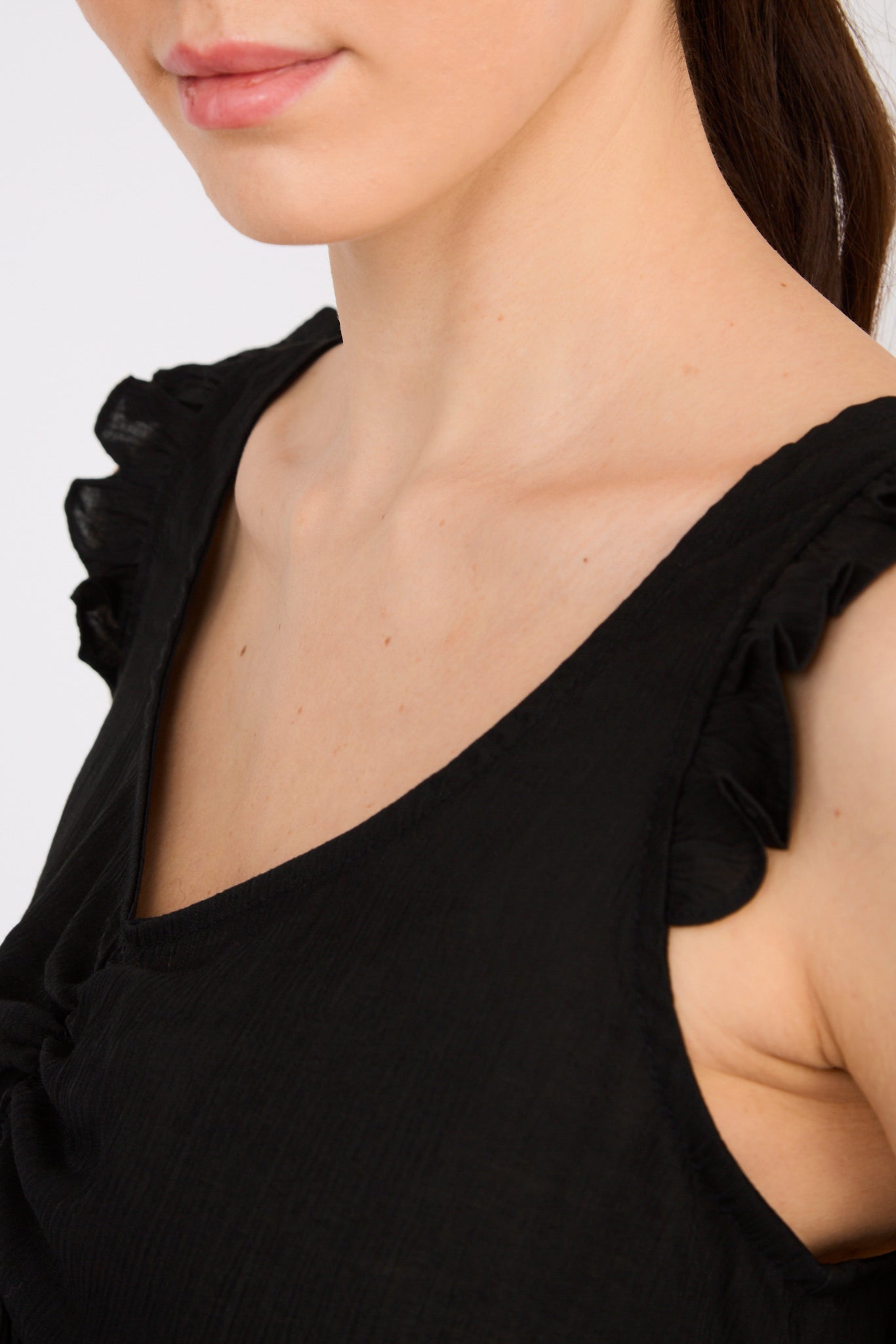 Black ruffle trim tie back tank_3