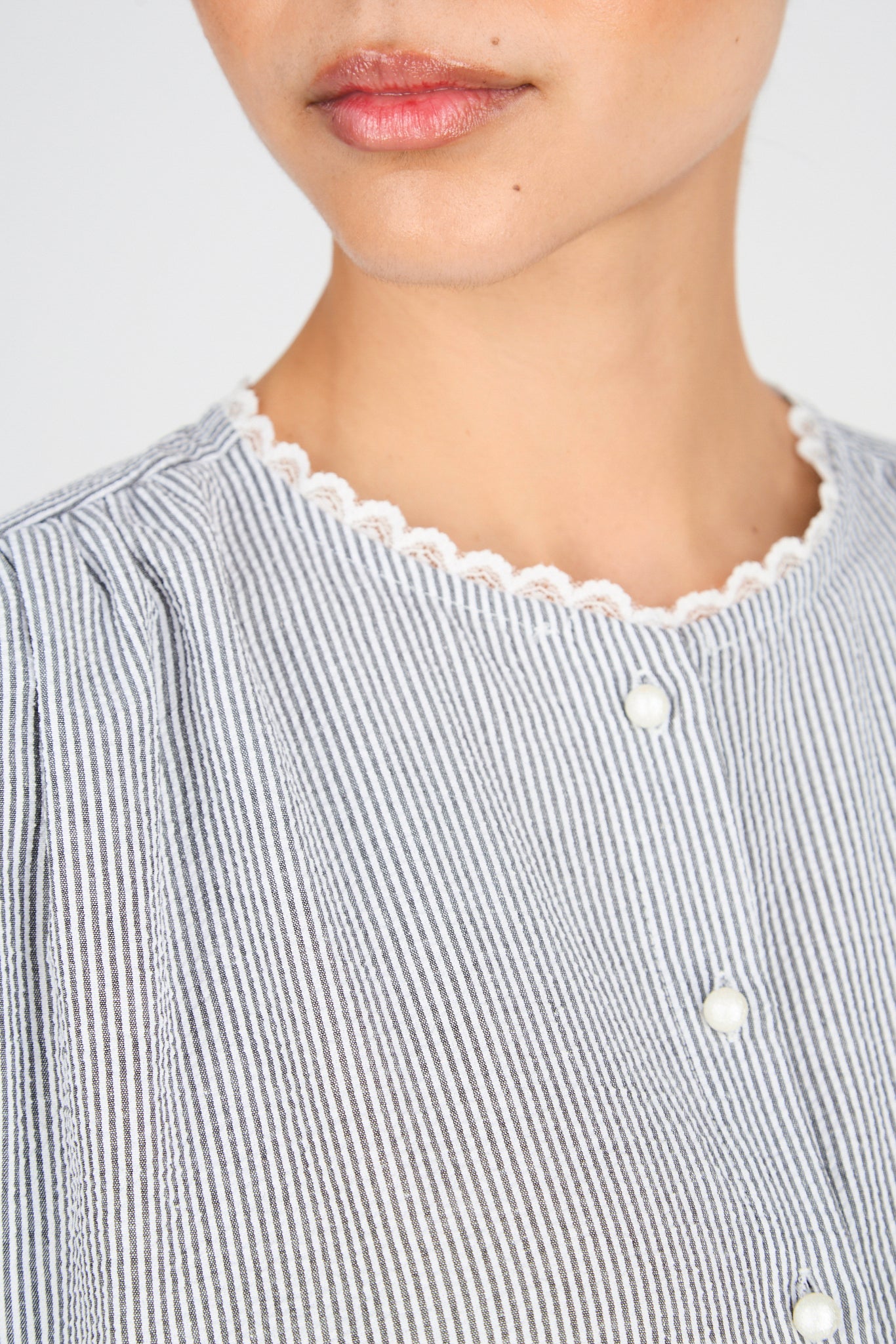 Black seersucker lace trim pearl button blouse_3