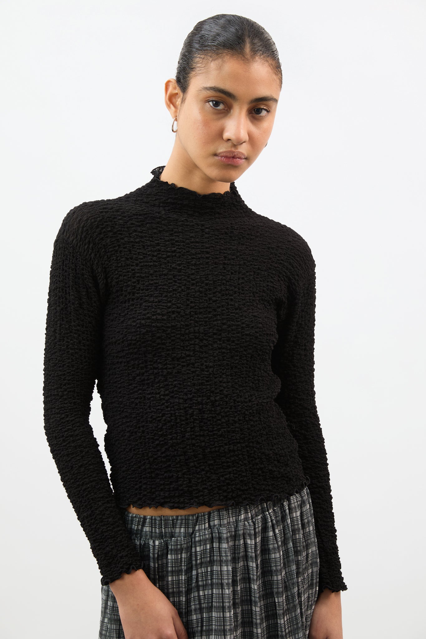 Black textured long sleeve mock neck top_1