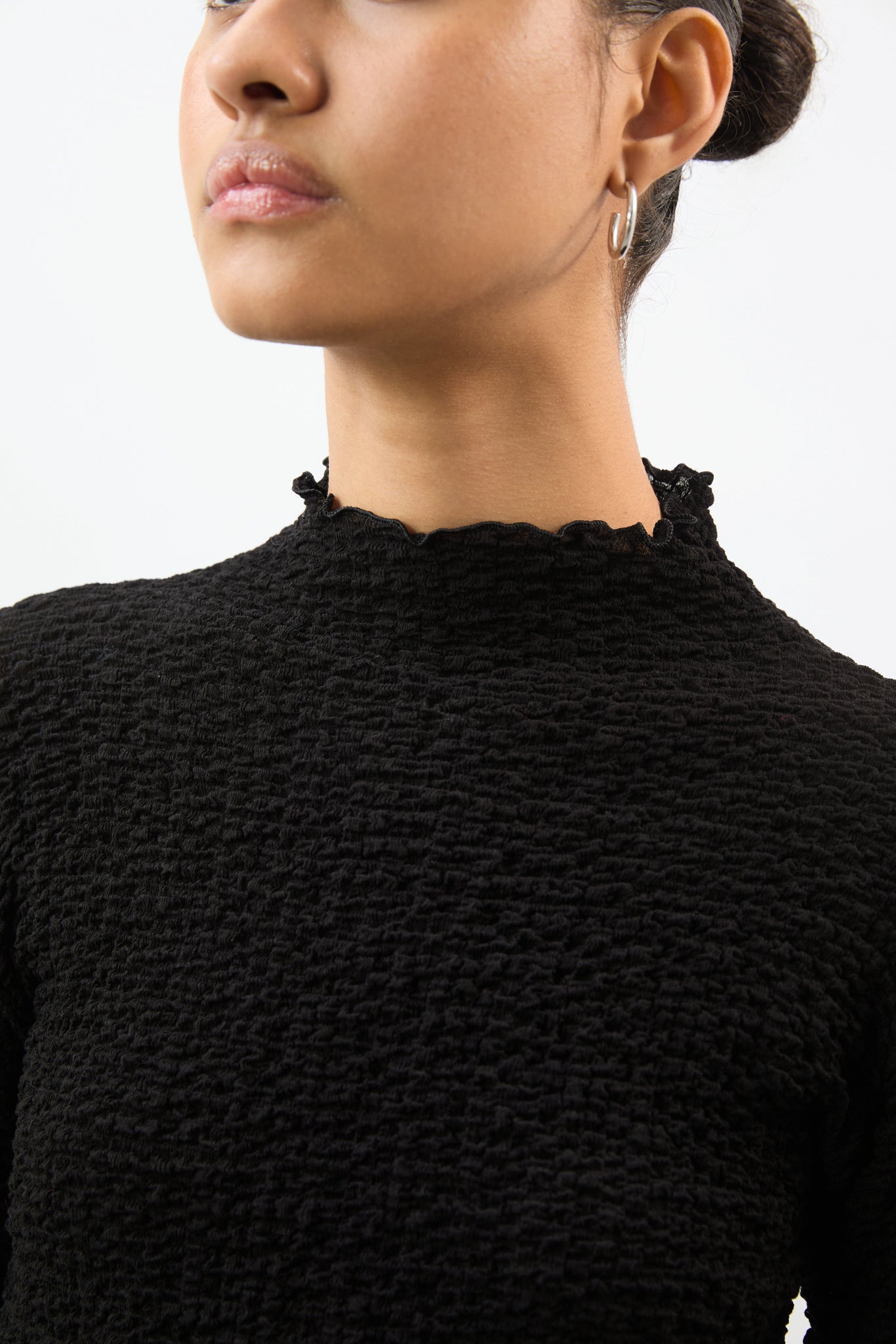 Black textured long sleeve mock neck top_3
