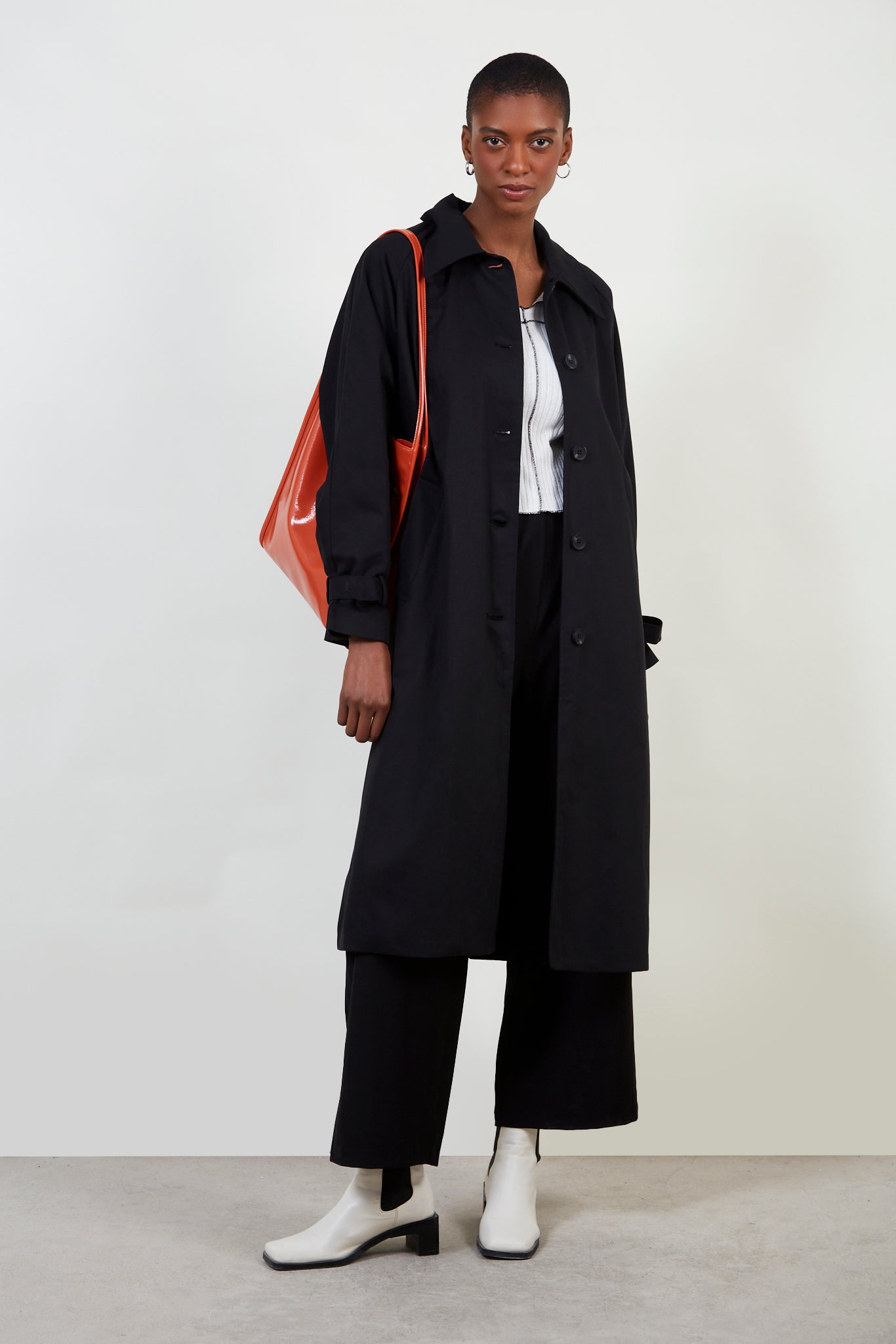 Black single breasted buckle detail trench coat_1