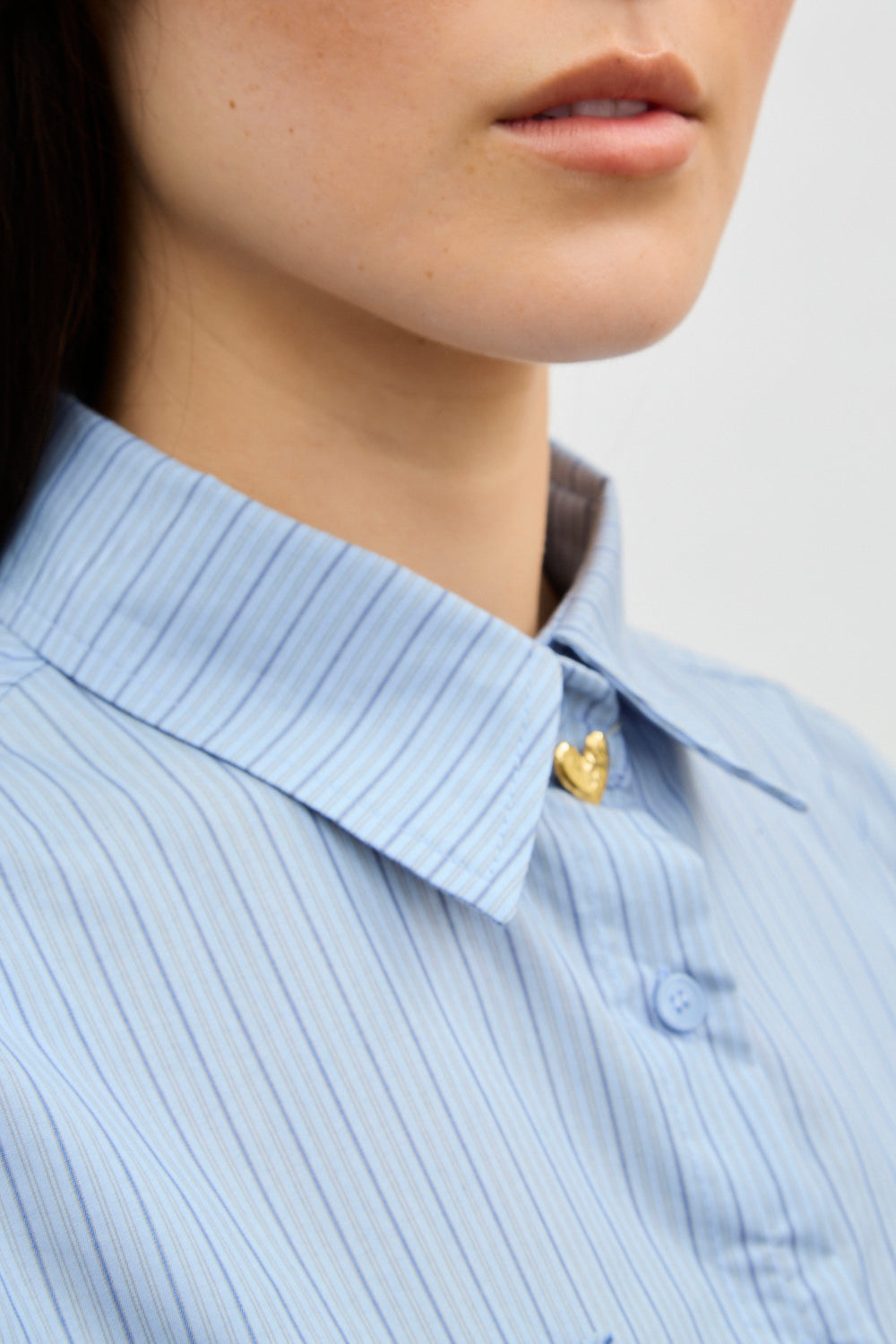 Blue striped ruffle pocket trim shirt_3