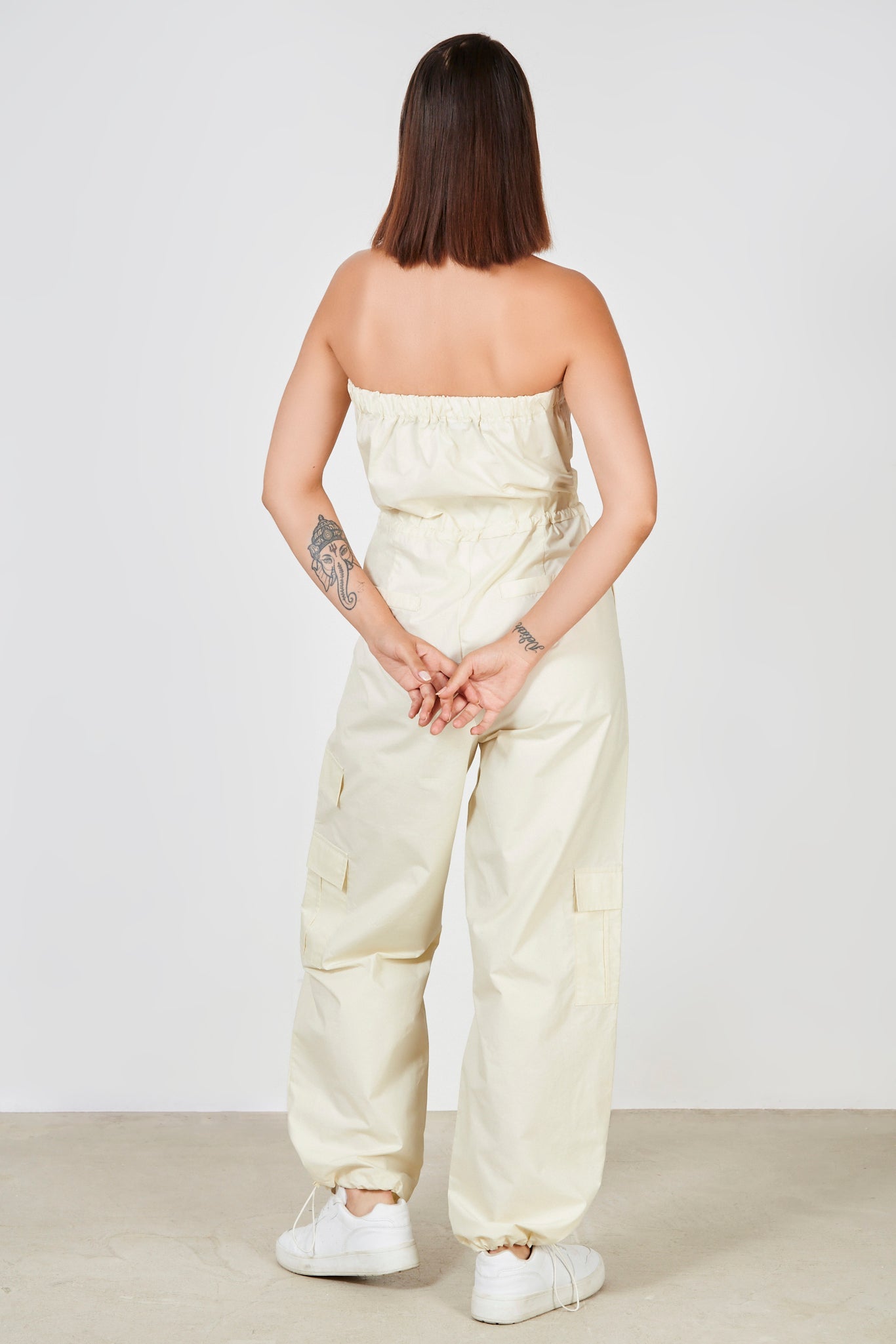 Cream strapless cinch waist jumpsuit_3