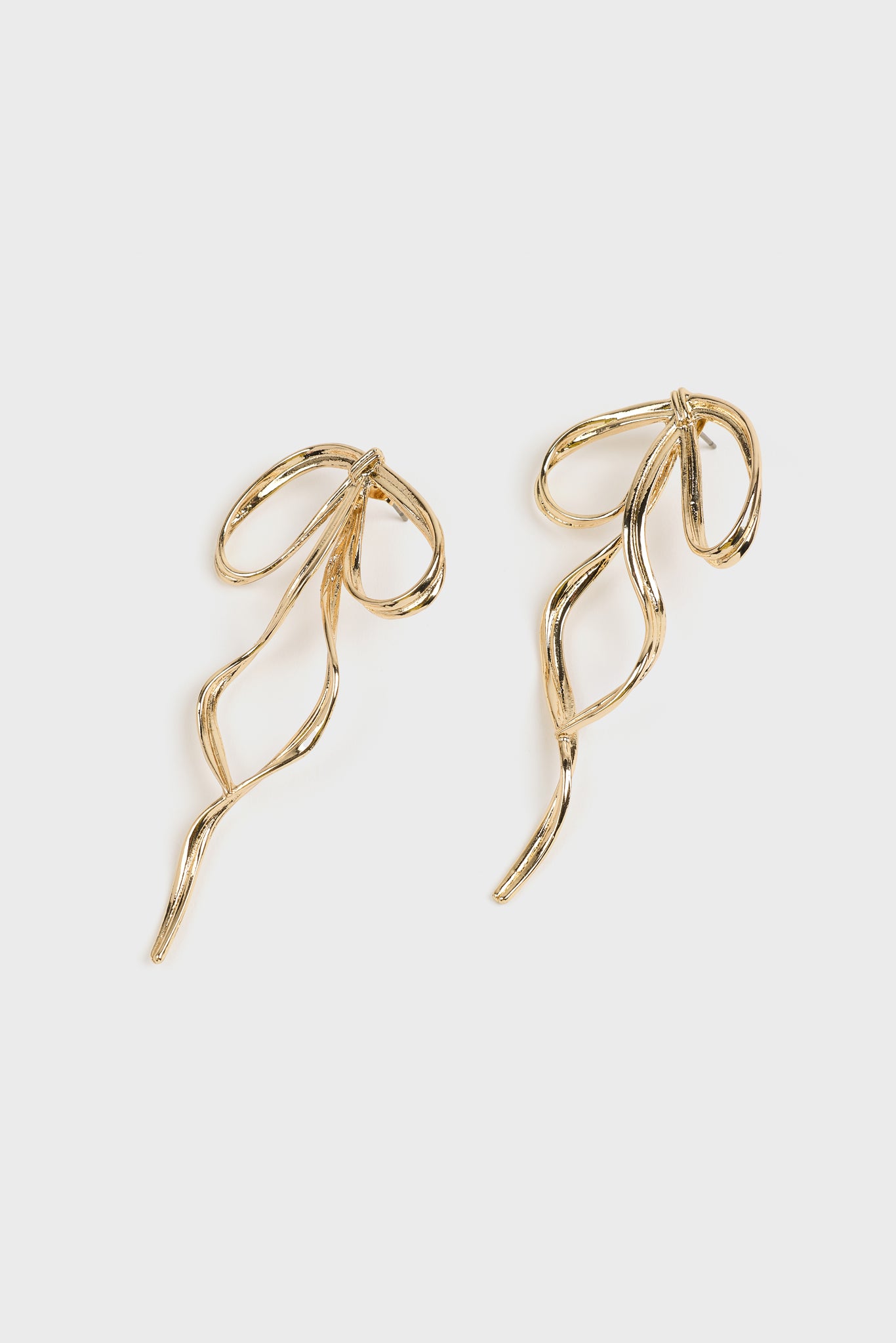 Gold bow stud earrings_2