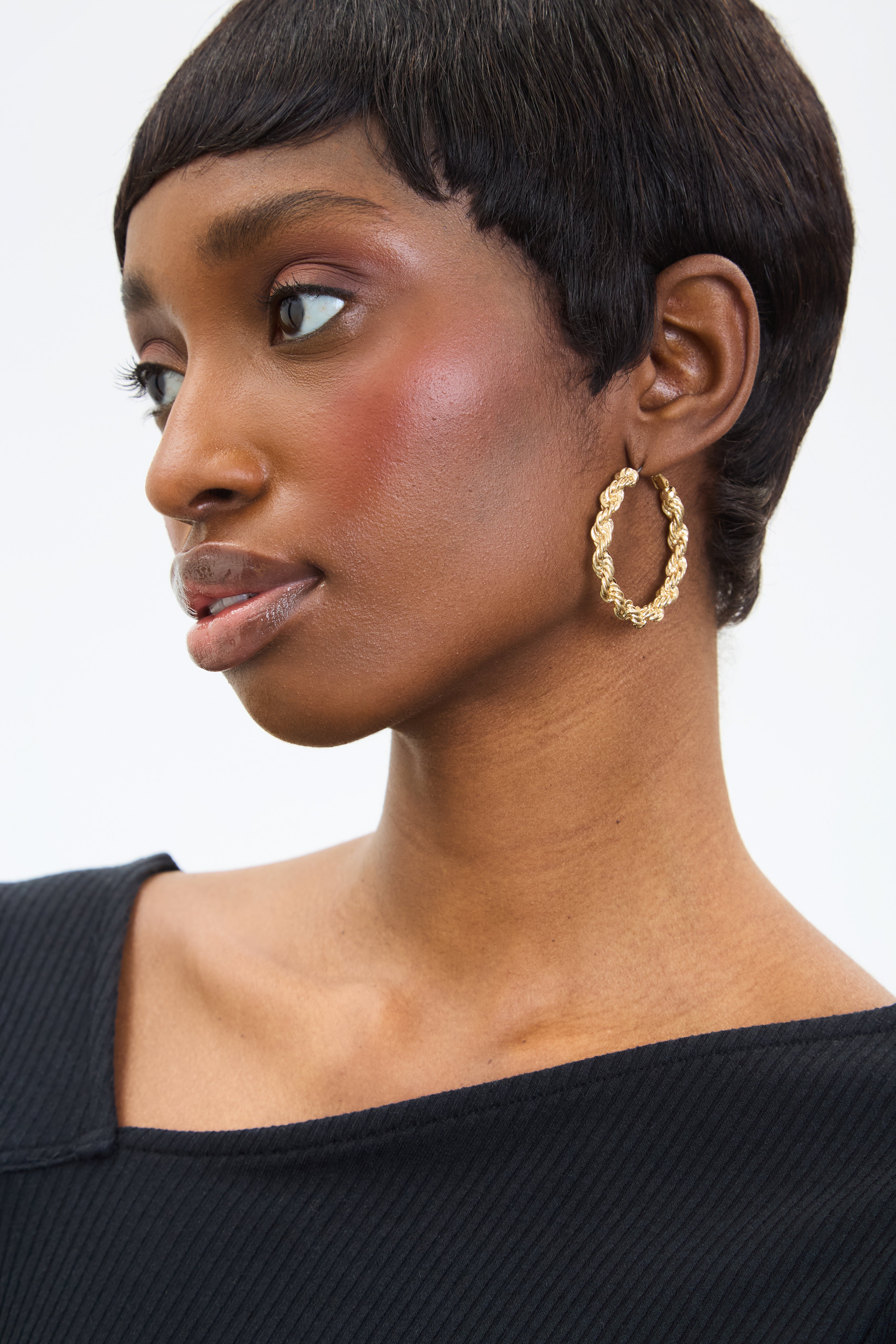 Gold large twisted hoop earrings_3