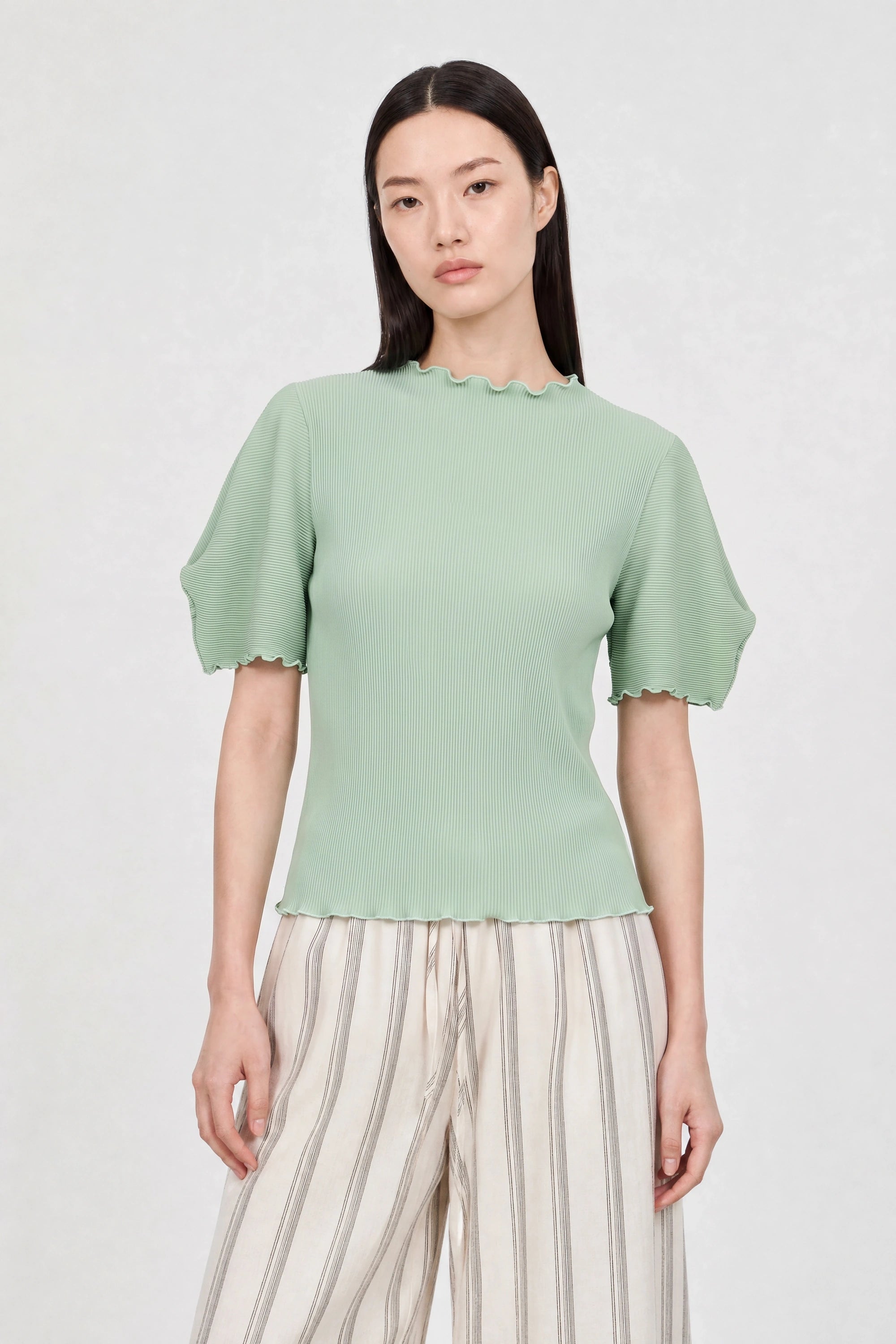 Green ribbed mock neck blouson sleeve top_1
