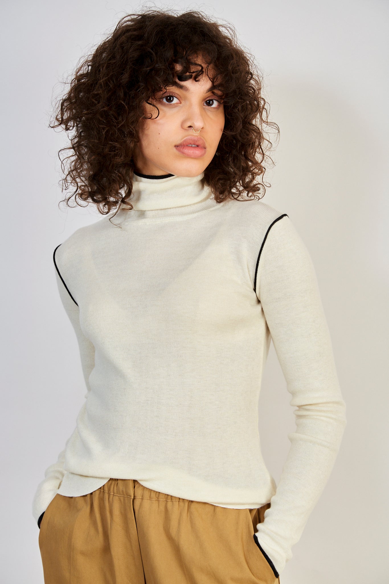 Ivory and black trim turtleneck top_1