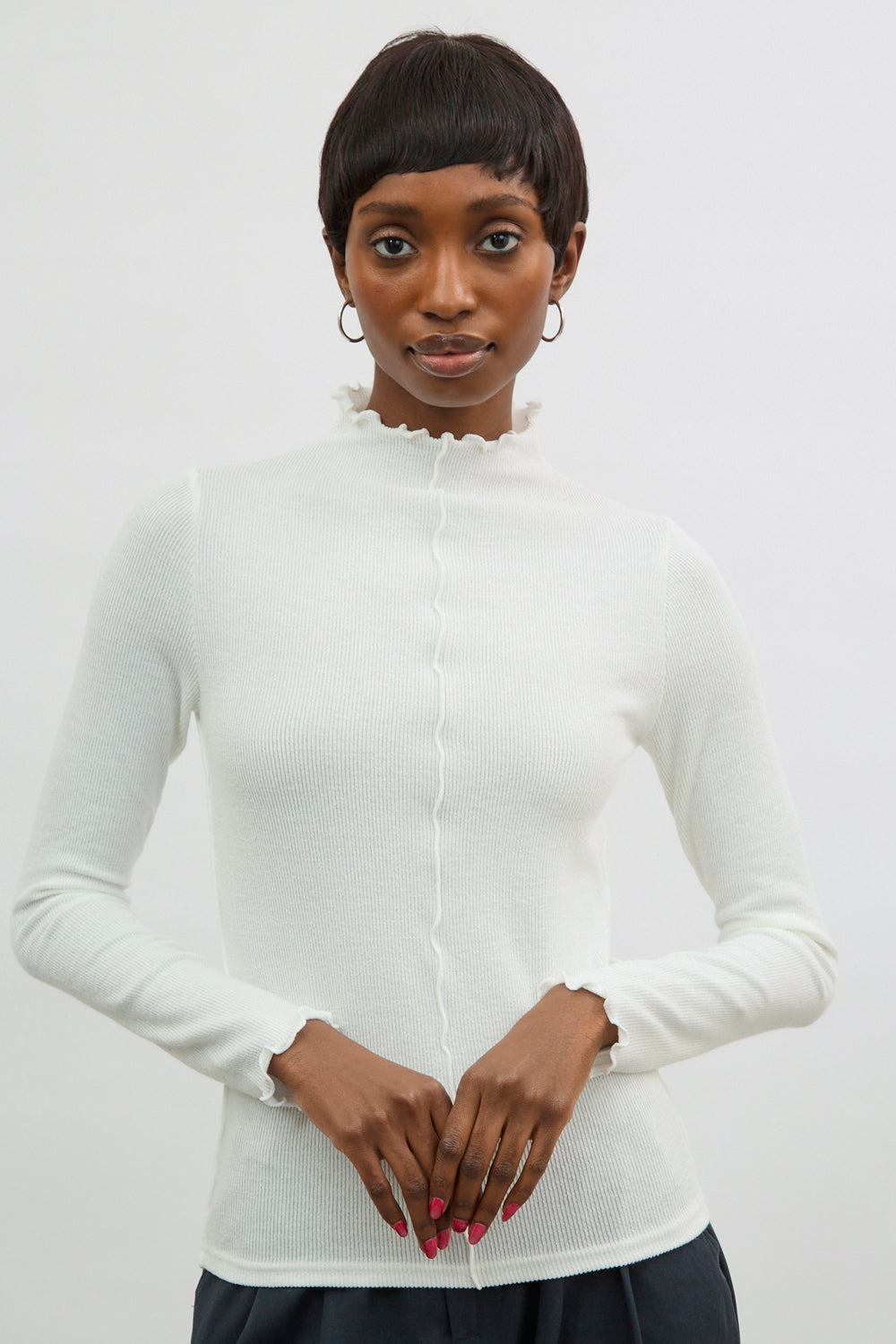 Ivory ribbed ruffle trim long sleeved top_1