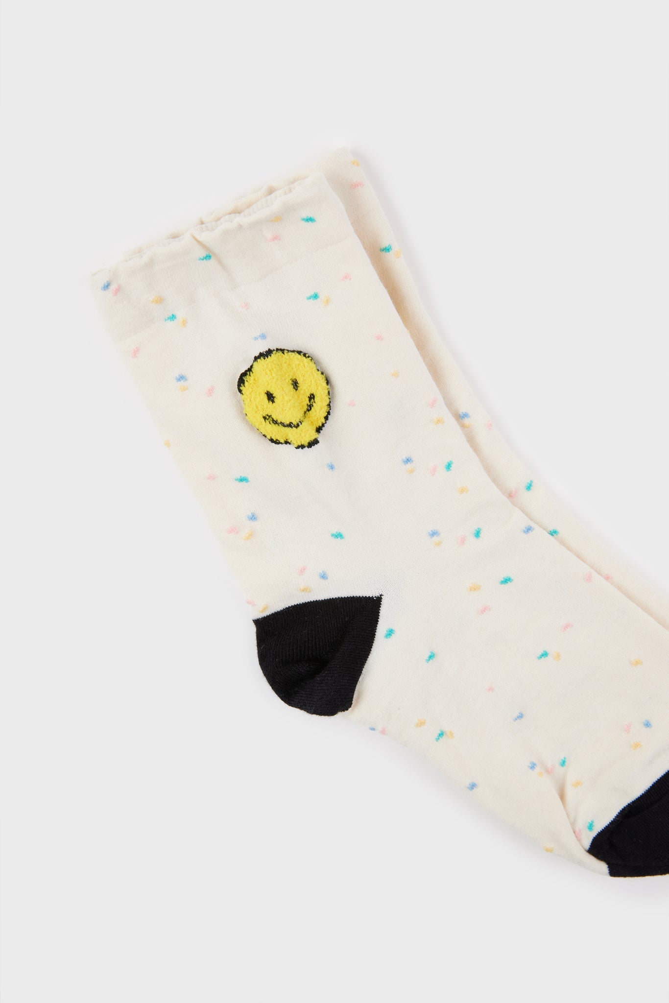 Ivory rainbow flecked smiley face socks_3