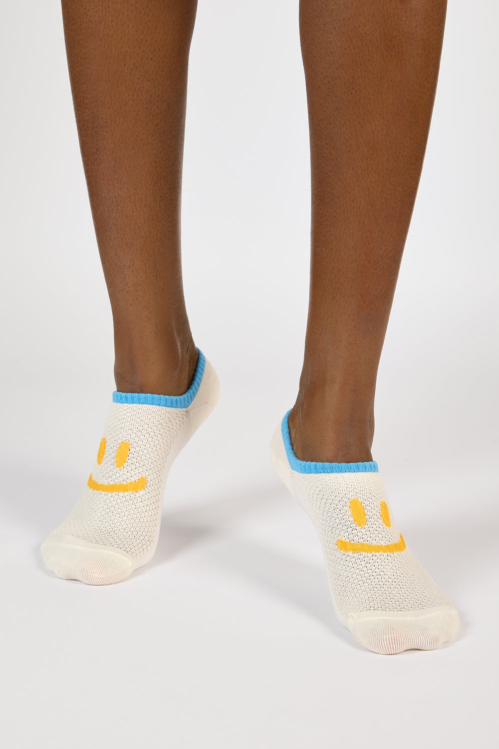 Pale yellow and blue giant smiley face pop socks_3