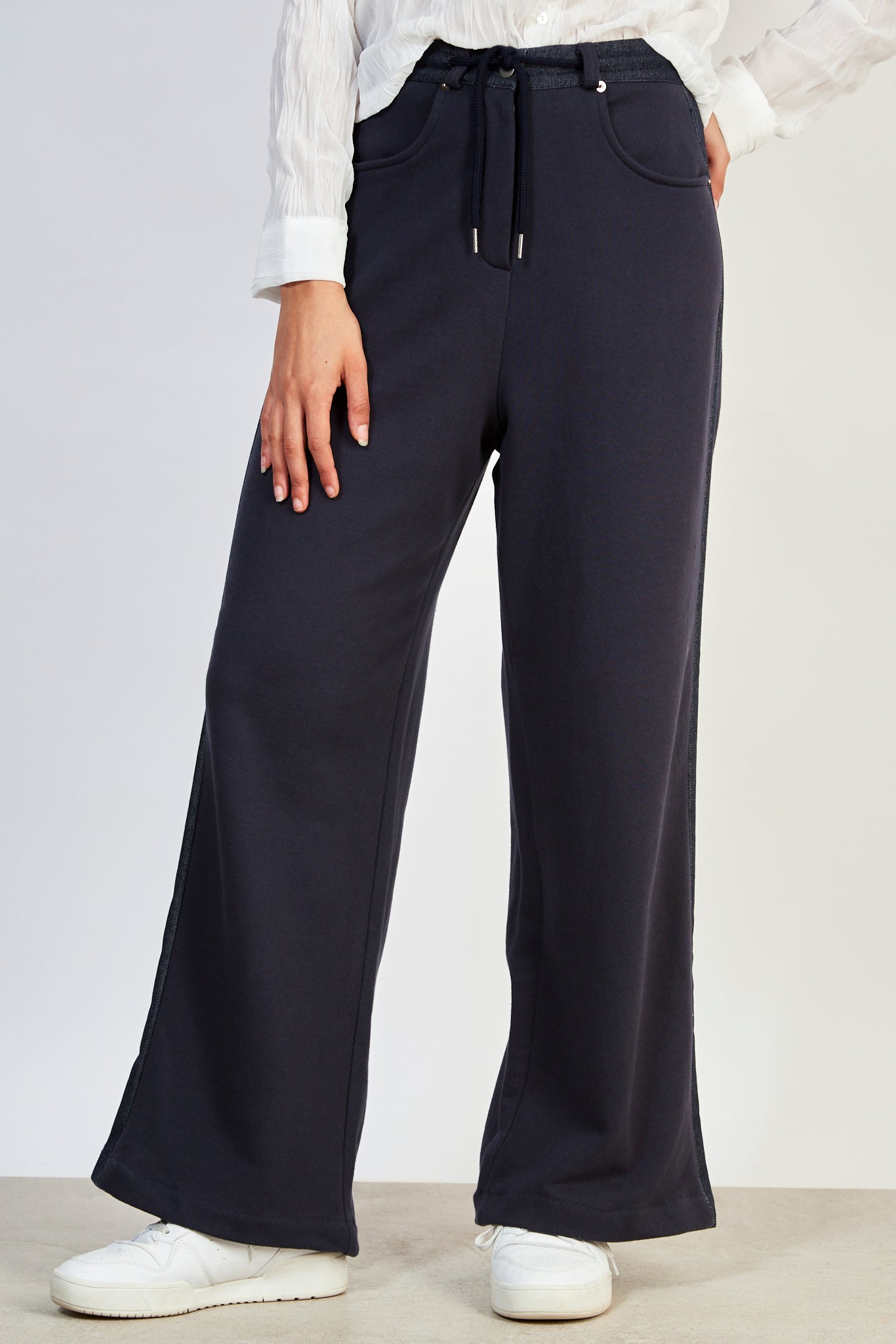 Blue denim and navy sweatpants_1