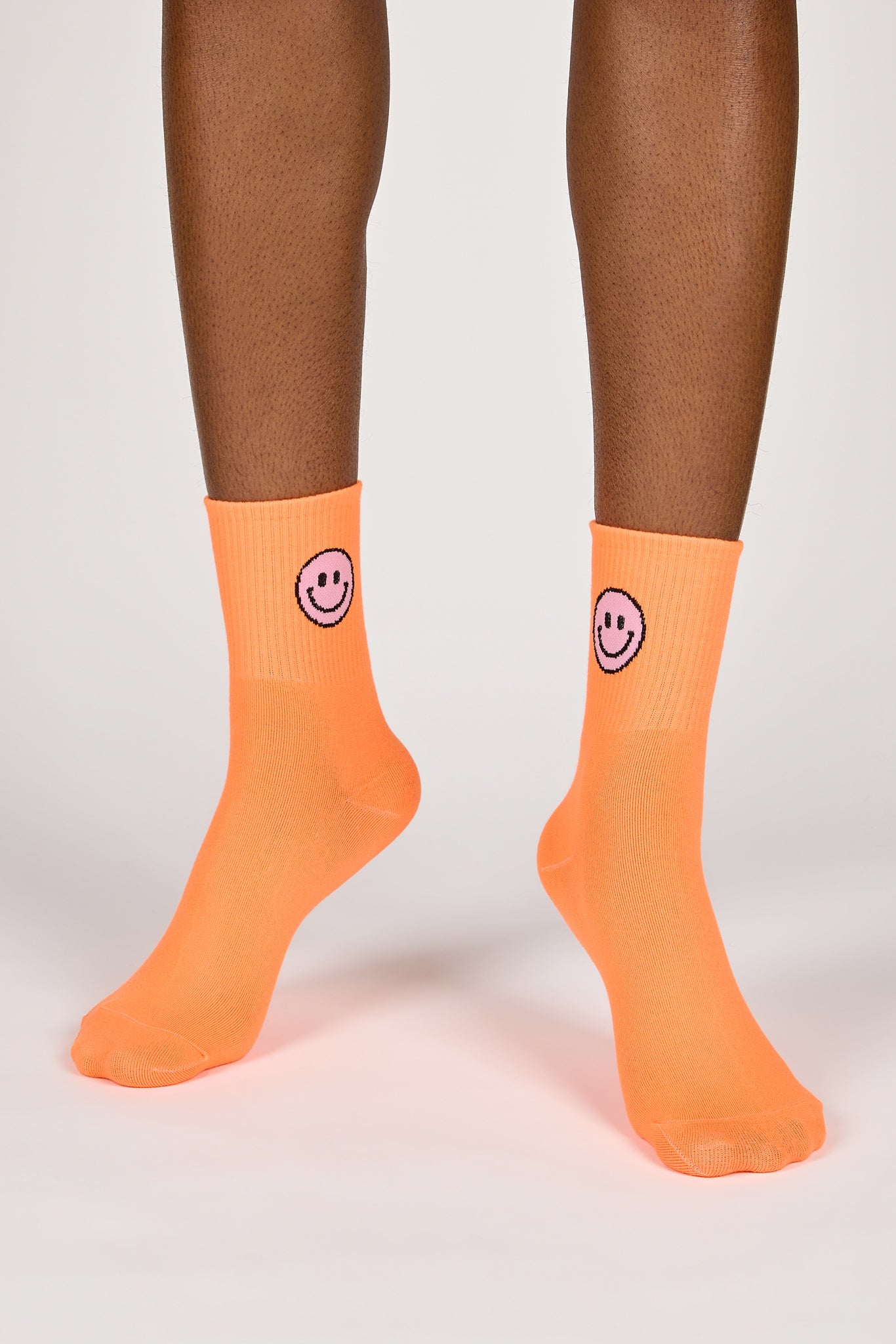 Neon orange smiley face socks_2