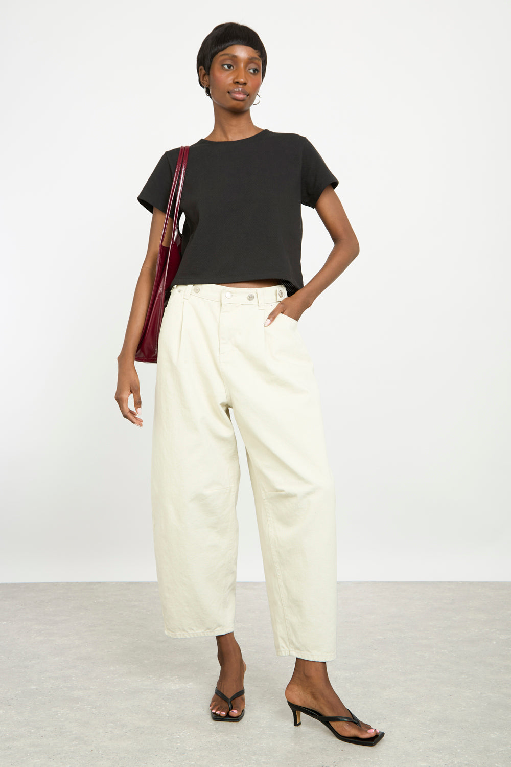 Off white adjustable waist balloon leg trousers_4