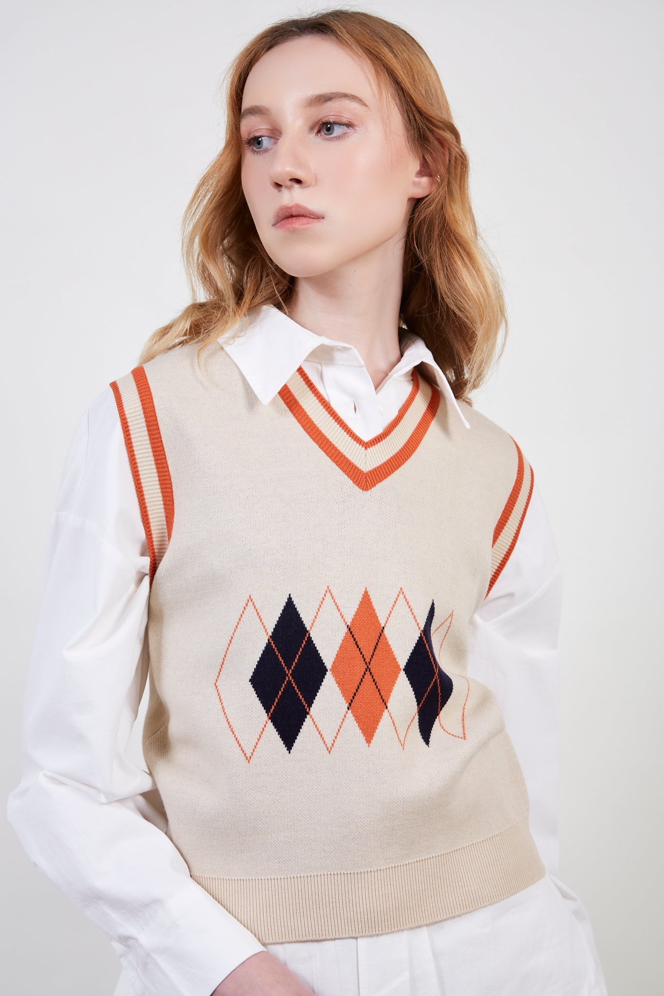 Orange varsity trim argyle vest_1