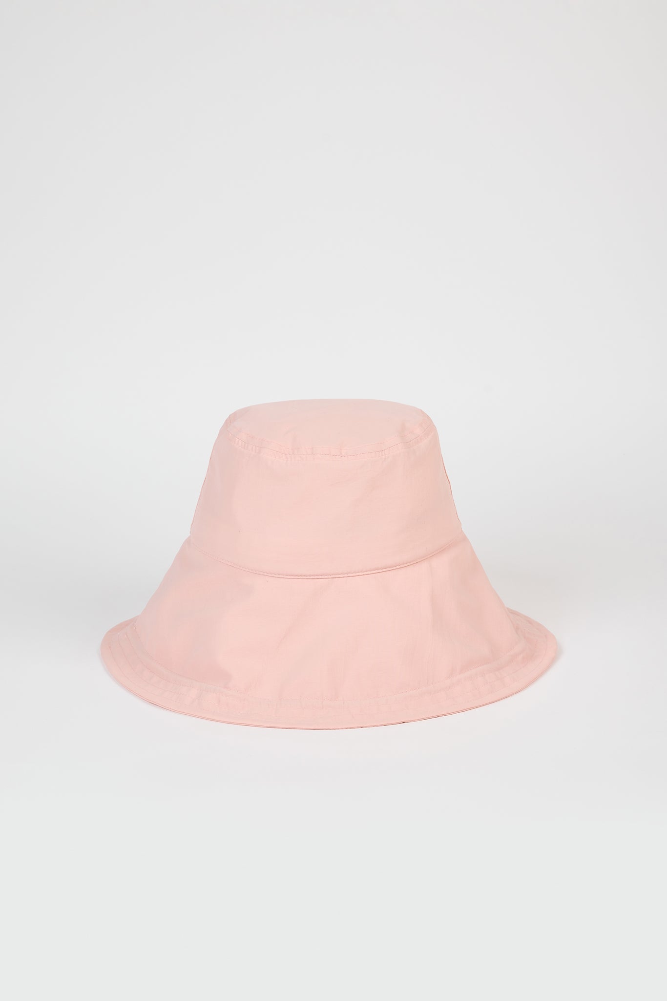 Pale pink nylon wide brim bucket hat_1