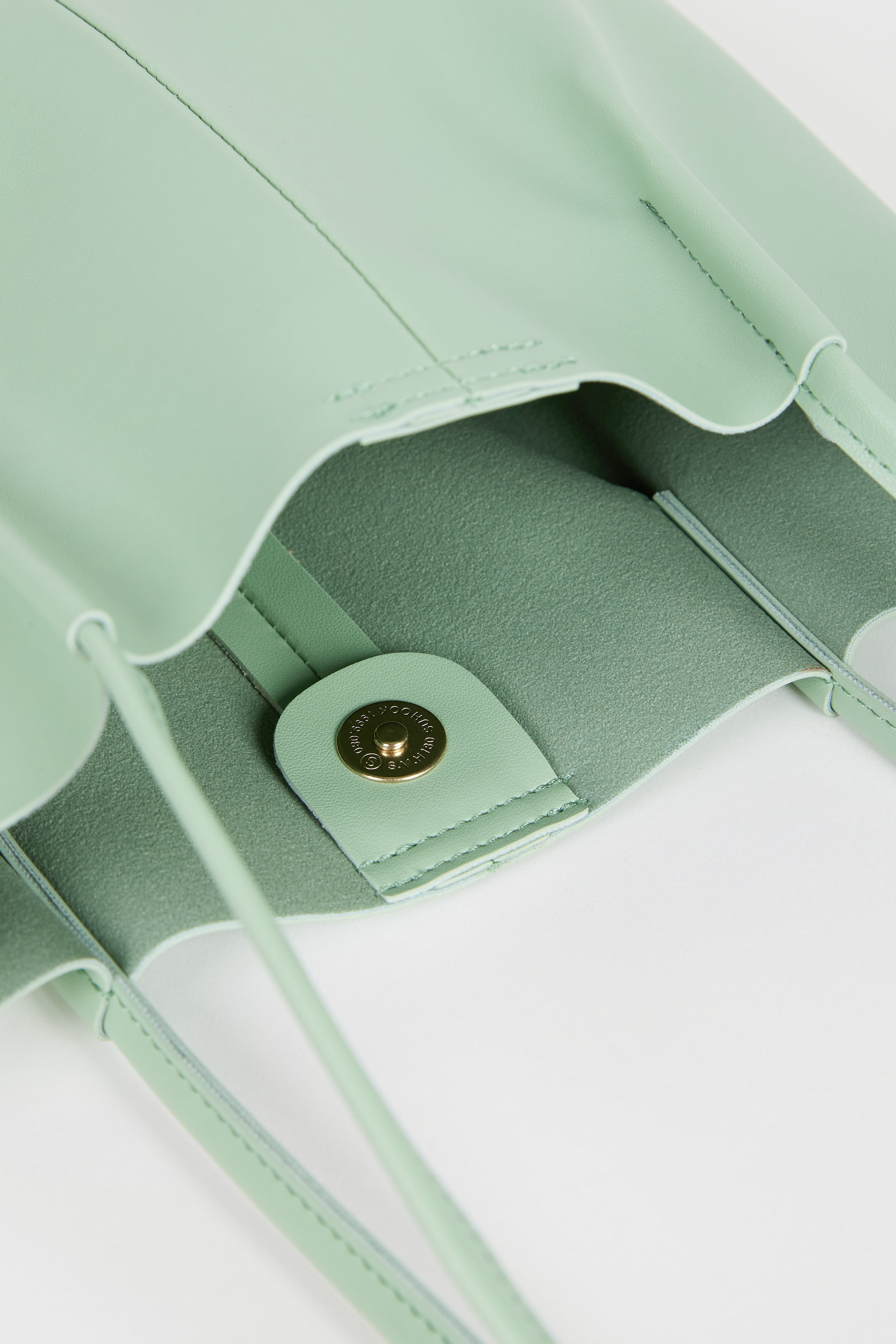 Sage green vegan leather pinched strap tote bag_2