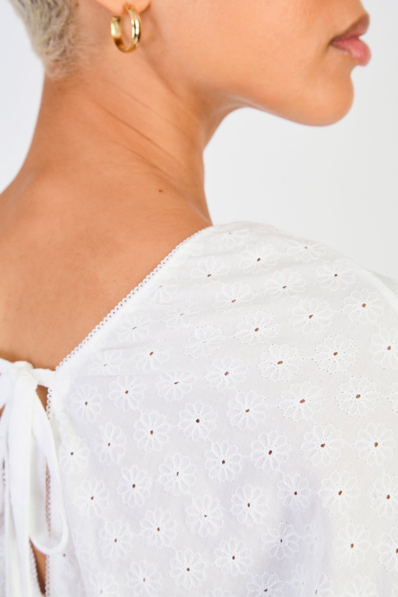 White eyelet open tie back shirt_3