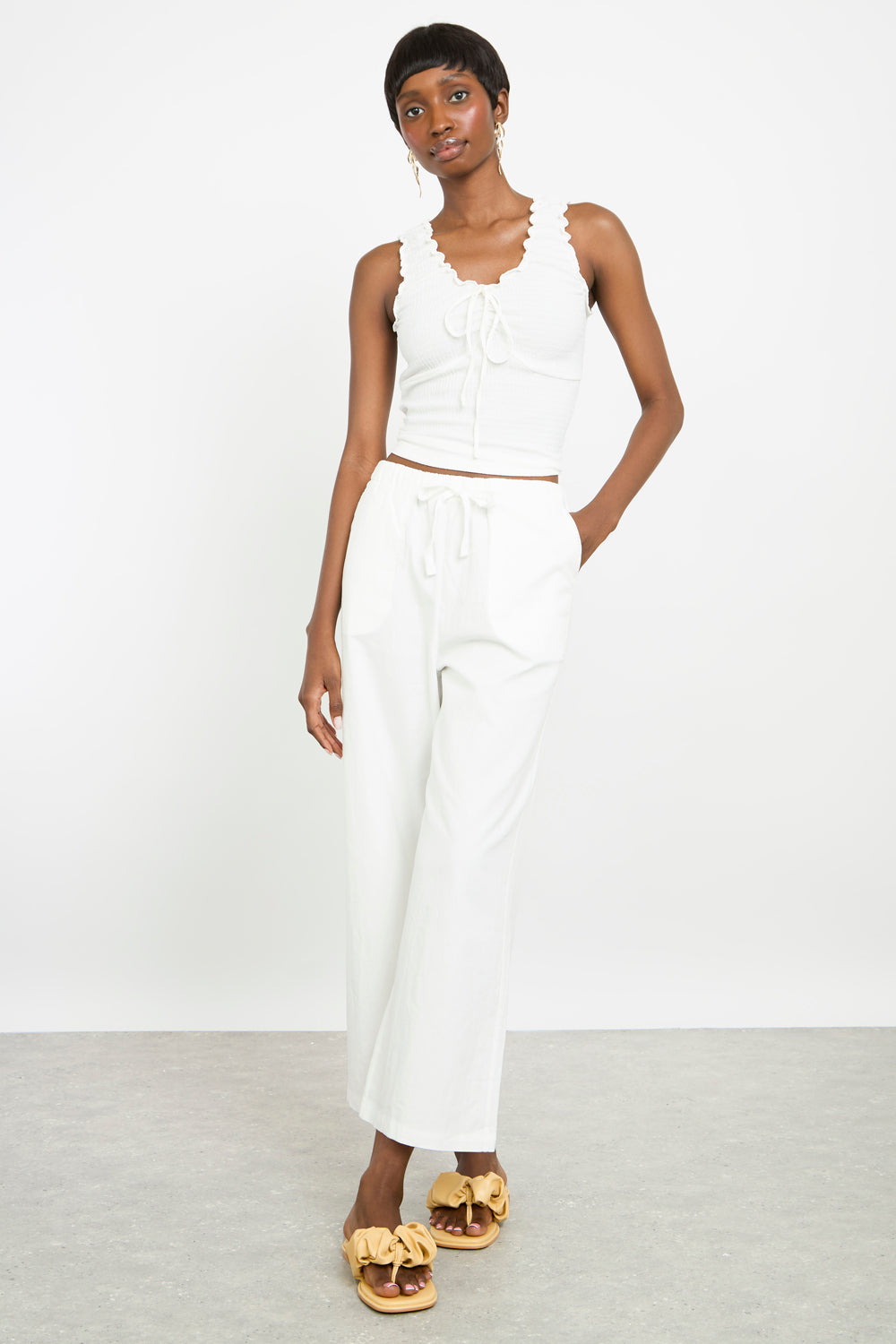 White ruffle trim tie front tank top_4