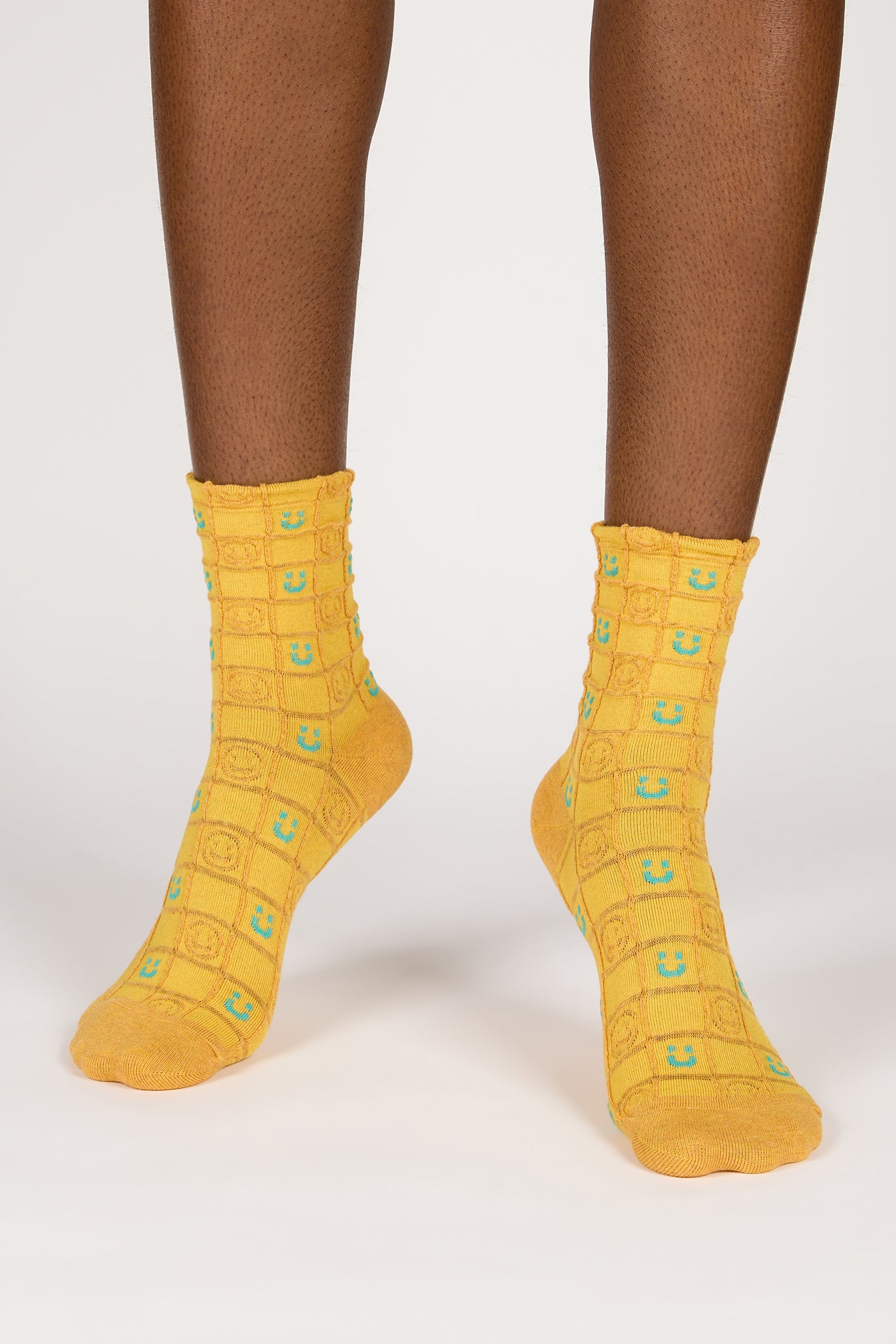 Yellow and green checked smiley face socks_2