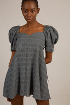Black and white textured off shoulder mini dress_1