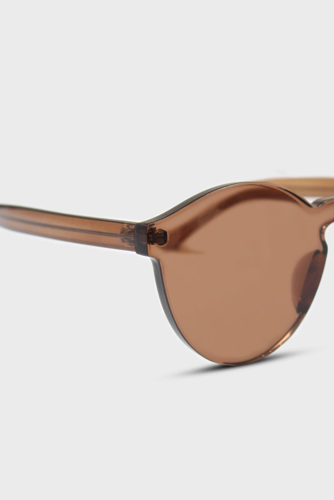 Brown frameless round sunglasses