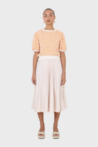 Ivory satin pleated thick waistband skirt_1