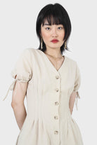 Beige V-neck tie sleeved linen romper_8