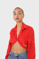 Bright red textured silky plunging tie front shirt_7