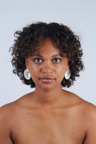 Ivory fleck and hammered silver disc earrings_5