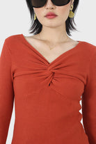 Orange cross front chest knit top_4